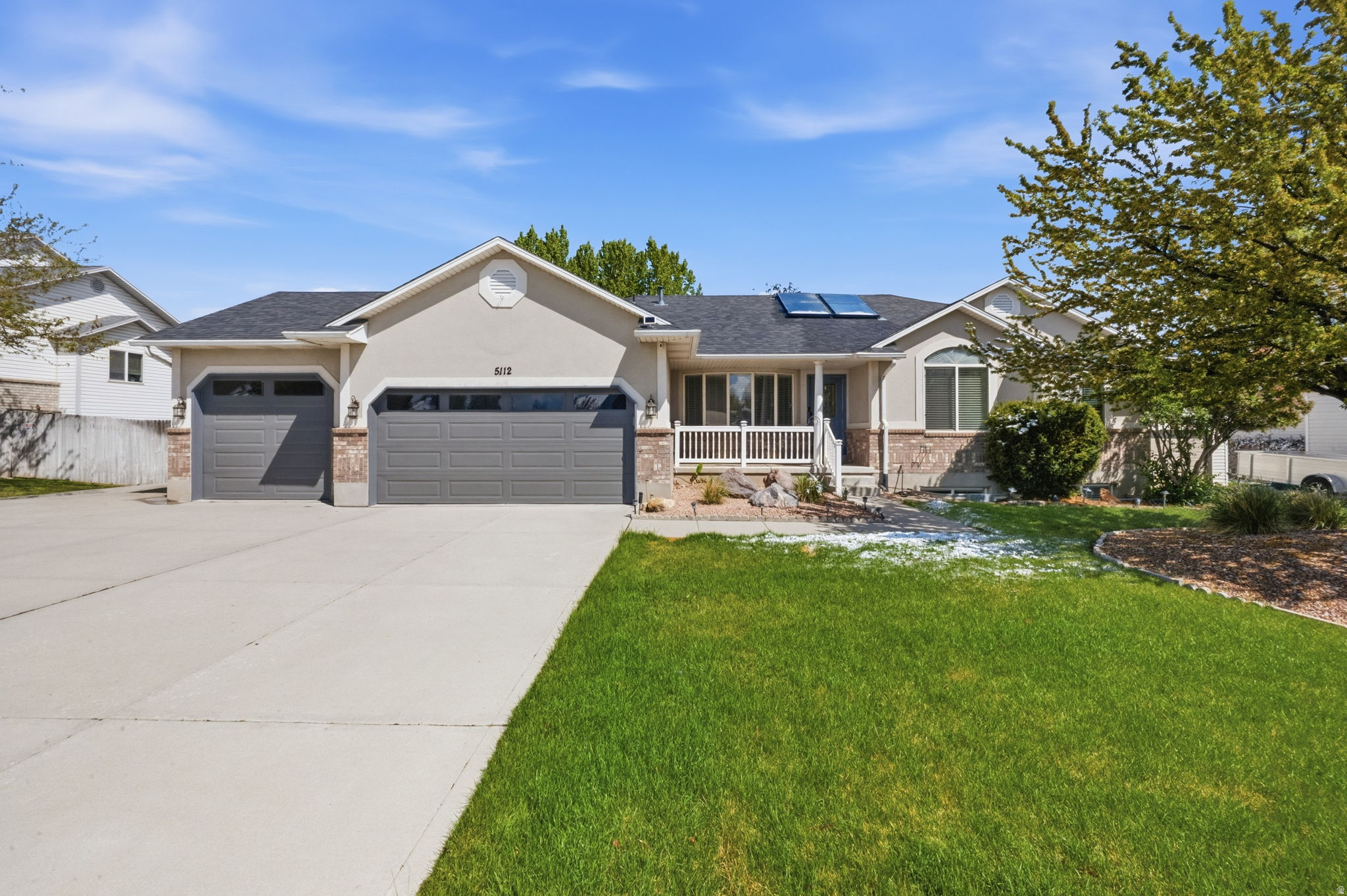 Great location in West Jordan! This bright and open home features laminate flooring, two-tone paint, vaulted ceilings, and granite countertops. The spacious primary suite includes a grand bathroom, and the home offers two fireplaces for added comfort. The basement includes a convenient kitchenette with a sink, microwave, and refrigerator. Additional highlights include can lighting and a large back patio with a pergola-perfect for outdoor living. The community offers a swimming pool, pavilion, playground, and open green space. Easy to show! Agent Related to Seller.