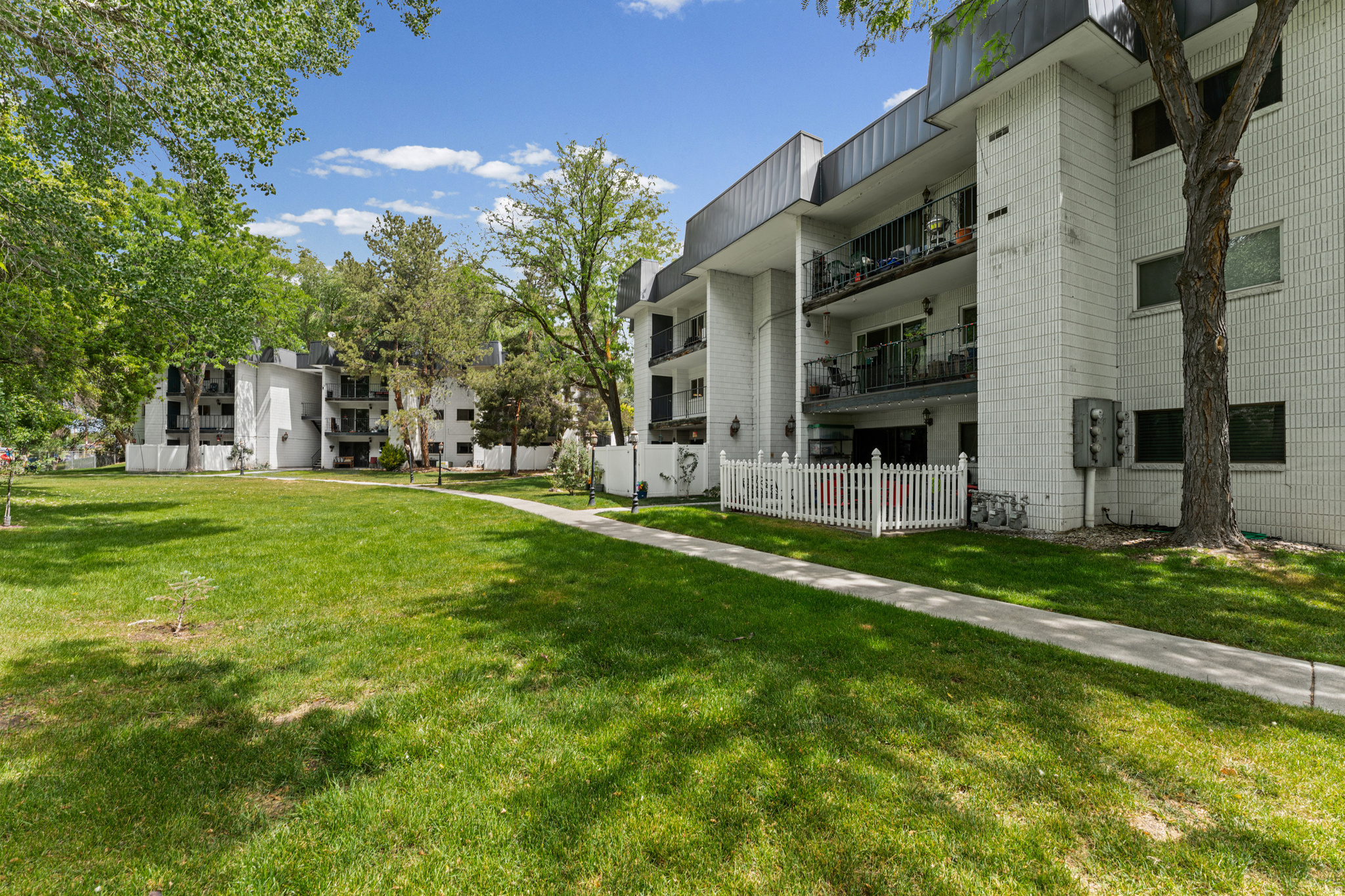 *Community is not FHA approved, however speak with your loan officer about a potential FHA spot approval.* Welcome to the most breathtaking, extensively renovated condo in all of Murray, where over $50,000 in upgrades have transformed every single inch into something truly extraordinary! Nestled within a serene, tucked-away community, the moment you arrive you will feel an immediate sense of peace and privacy that is almost impossible to find at this price point. Step through the front door and prepare to be wowed by a stunning open-concept kitchen and family room flooded with natural light, perfectly designed for both everyday living and effortless entertaining. The kitchen is nothing short of a chef's dream, showcasing a sleek modern peninsula island with Dekton countertops, a farmhouse-style stainless steel sink, a bold stainless steel range hood, subway tile backsplash, stainless steel appliances, modern lighting, soft-close cabinetry, a semi-formal dining space, and storage that will genuinely leave you speechless. Just beyond, your private covered Romeo and Juliet balcony opens to tranquil, neighbor-free views, the perfect sanctuary for your morning coffee or evening unwind. The primary suite is generously sized with gorgeous tile floors, double closets, and a spa-inspired en-suite featuring European glass and tile work, a modern vanity, new mirror, new floors, new toilet, and the ultimate convenience of an in-unit laundry setup. A spacious second bedroom offers tile floors and incredible storage, while the fully updated guest bath mirrors the same refined finishes found throughout the home. To top it all off, this property sits in an unbeatable location just minutes from Murray Park, Mick Riley Golf Course, Costco, the hospital, and an abundance of shops and restaurants, and comes equipped with a furnace and air conditioning unit both approximately two years young. This is the one you have been waiting for, schedule your private showing today before it is gone! Buyer and Buyers agent to verify all information. Square footage figures are provided as a courtesy estimate only. Buyer is advised to obtain an independent measurement.