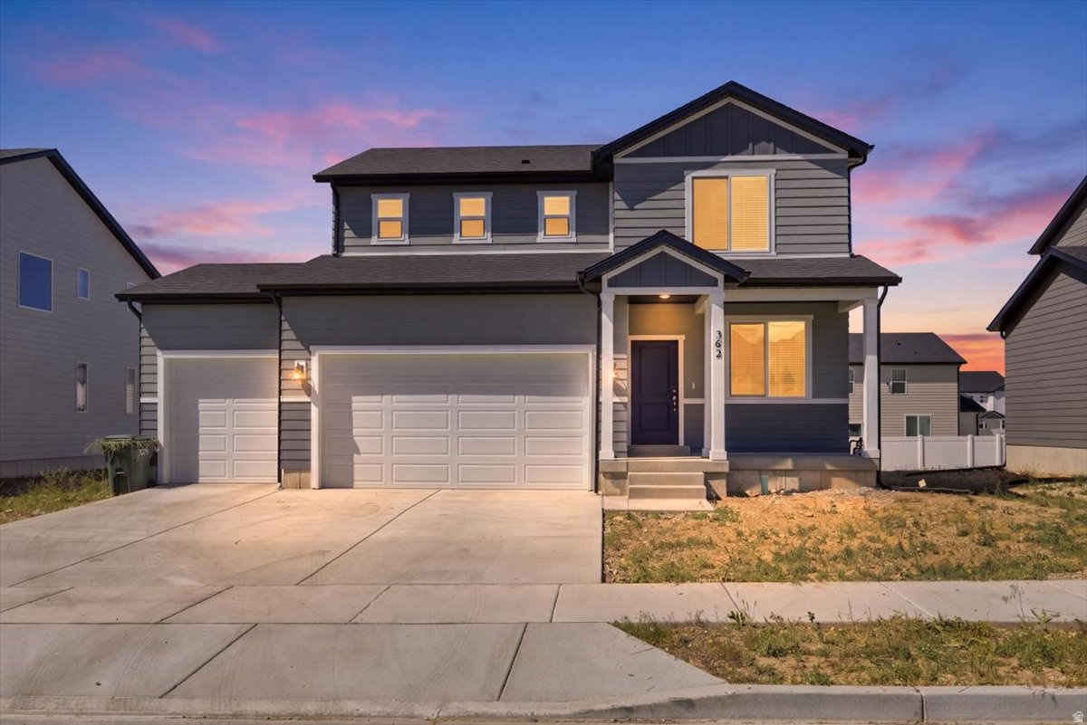 Welcome to this beautiful 2-story, energy-efficient home built at the end of 2025 in growing Tooele! Offering 3 bedrooms, 2.5 bathrooms, plus a dedicated office/flex space and spacious upstairs loft, this home was thoughtfully designed with both comfort and functionality in mind. The open-concept kitchen flows into the dining and family room, creating the perfect setup for entertaining, gathering, or everyday living. Upstairs, the loft provides additional living space ideal for a second family room, play area, workout space, or home office. The unfinished basement offers room to grow and the opportunity to customize the space to fit your needs. Additional upgrades include a professionally installed radon mitigation system for added peace of mind, plus approximately 6 months remaining on the builder home warranty. The 3-car garage is equipped with a smart opener allowing you to control the garage door from an app. Front door lock, smoke alarms, and smart thermostat are a plus! Doorbell can be connected to a security system. Make an appointment to view this new home, only lived since December 2025!