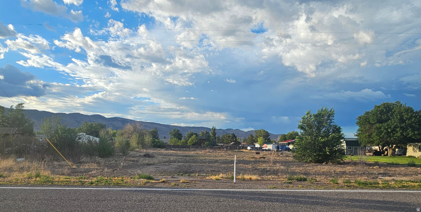 Imagine building your dream home in one of Central Utah's most charming small towns. This spacious 0.80-acre lot in the heart of Joseph offers breathtaking mountain views, peaceful surroundings, and the convenience of in-town living. With plenty of room for a home, shop, garden, RV parking, or outdoor entertaining, you'll have the space to create the lifestyle you've been dreaming of. An asphalt road provides easy, year-round access, and culinary water, natural gas, and power are all available at the street, making the property ready for your vision. Whether you're ready to build now or invest for the future, this is a rare opportunity to own a beautiful piece of Joseph. The City may also be open to rezoning the property for commercial use, offering additional possibilities. Come walk the property, take in the views, and imagine the possibilities!