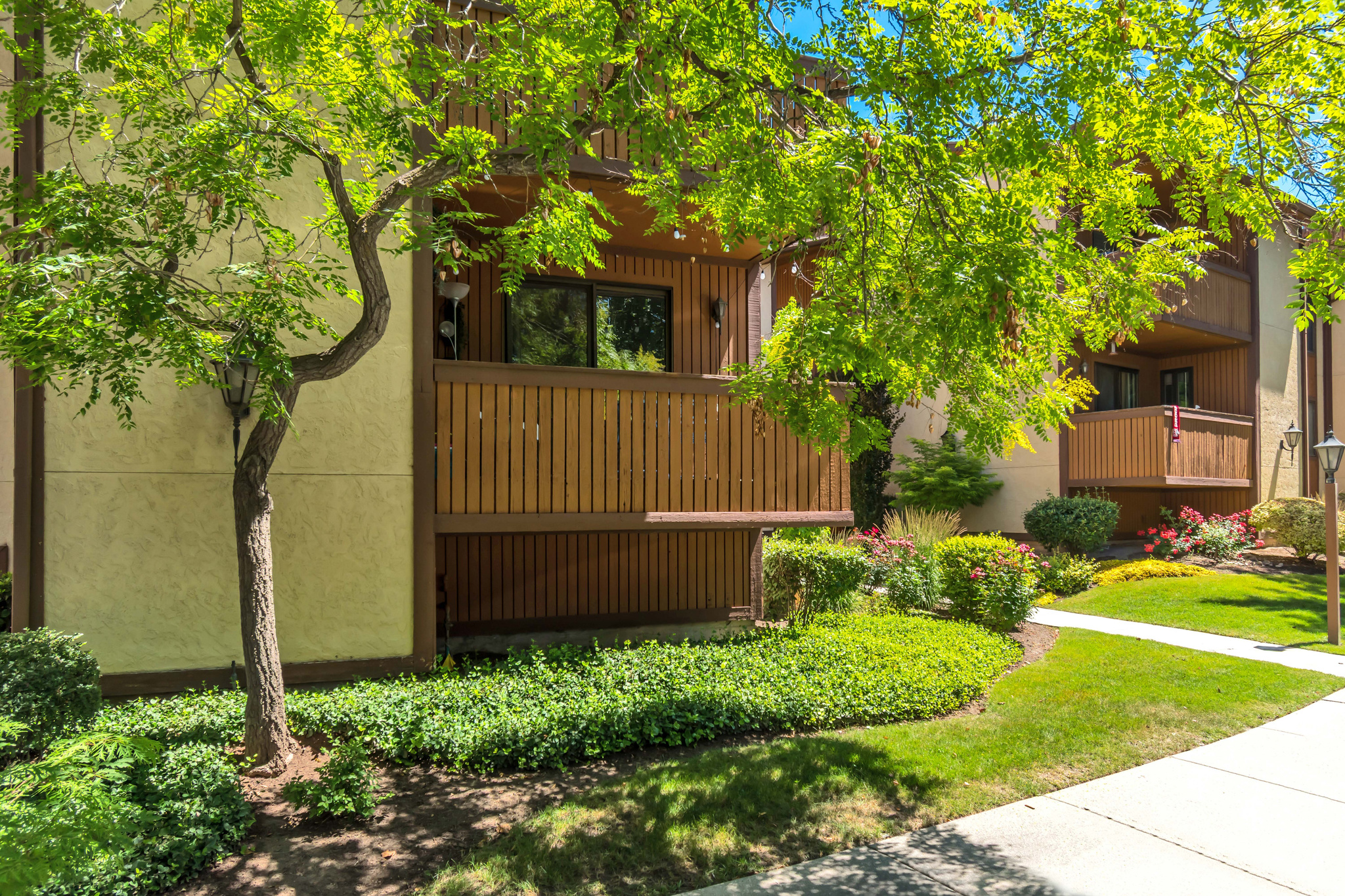 Welcome to this beautifully updated Condo w/ newer kitchen, carpet & LVP plus 3 tone paint throughout, move-in ready 2 bedroom, 2-bath condo nestled among lush, beautifully maintained landscaping with a river for waterfront walks. Conveniently located minutes from I-215 & I-15, this community features resort-style amenities including a large pool, tennis courts, indoor spa, gym, and more. Assigned garage parking and a locked storage closet complete the package.