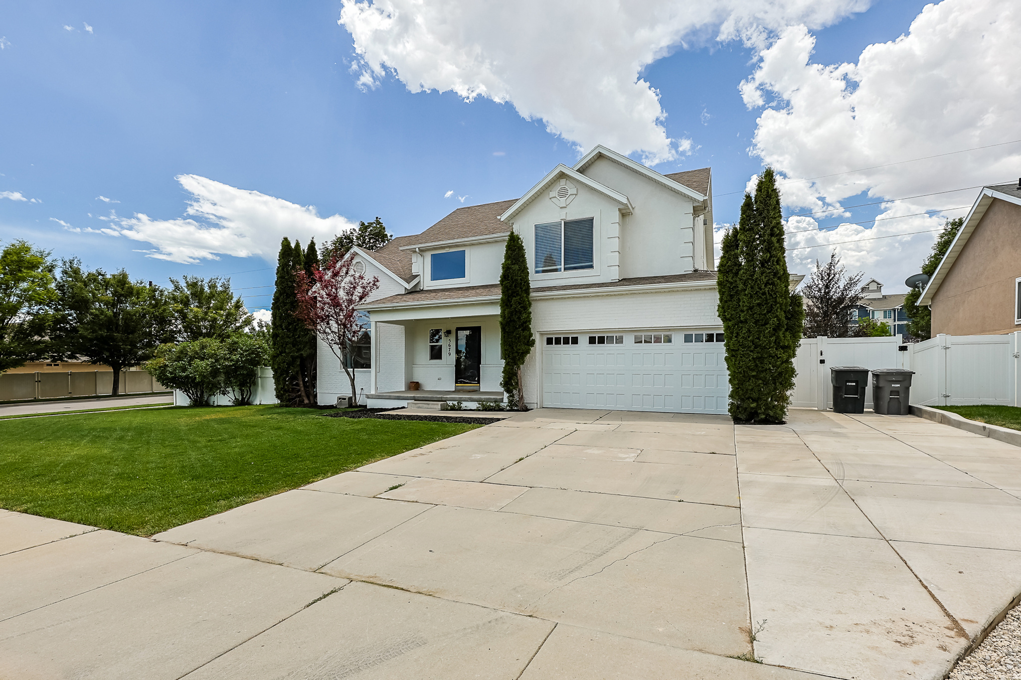 Welcome to this charming two-story home in South Jordan, situated on a spacious 0.25-acre lot with no HOA. Featuring an open-concept floor plan and soaring vaulted ceilings, this home offers both comfort and functionality. Upstairs, you'll find four bedrooms, including a generously sized primary suite with a walk-in closet, as well as a conveniently located second-floor laundry room.  The beautiful kitchen comes complete with all appliances, making it truly move-in ready. The home also includes fully paid-off solar panels, installed in 2017, which are owned outright and will transfer to the new owner. Conveniently located near The Ballpark at America First Square (formerly the Bees' stadium), Daybreak, Mountain View Corridor, Mountain View Village, shopping, schools, the TRAX station, and a hospital, this home offers easy access to everything you need. Square footage figures are provided as a courtesy estimate only. Buyers are advised to obtain an independent measurement. Please see Agent Remarks for showing and offer instructions.