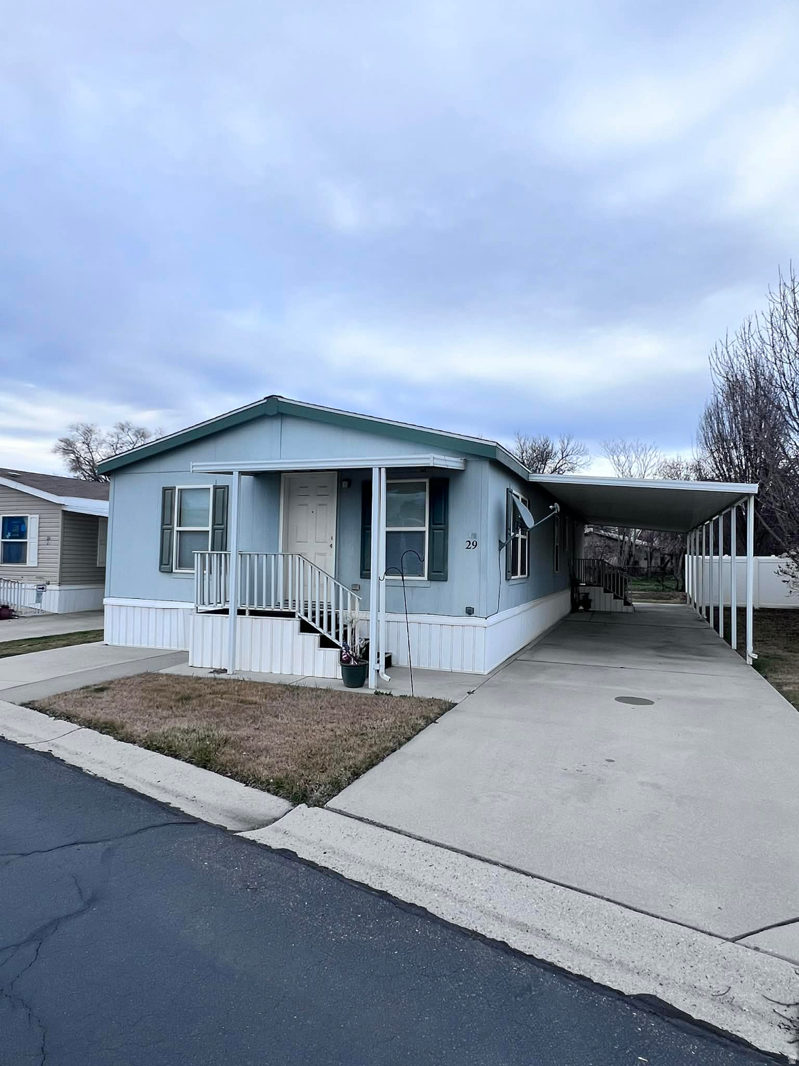 Skip the renovations and move straight into comfort! One of the Lowest Park Rents in the Area! This 3-bedroom gem features $29k in recent upgrades, including a new roof and new water heater. The heart of the home has been fully revitalized with new interior paint, new carpet, and a full suite of brand-new appliances (Stove, Fridge, Dishwasher, Disposal, Washer, and Dryer). Located in a peaceful 55+ community, this is rare, high-value find where all the big-ticket items have already been handled for you. Enjoy an unbeatable location near the TRAX station, shopping centers, parks, and restaurants. Square footage figures provided as a courtesy estimate; Buyer is advised to obtain an independent measurement.