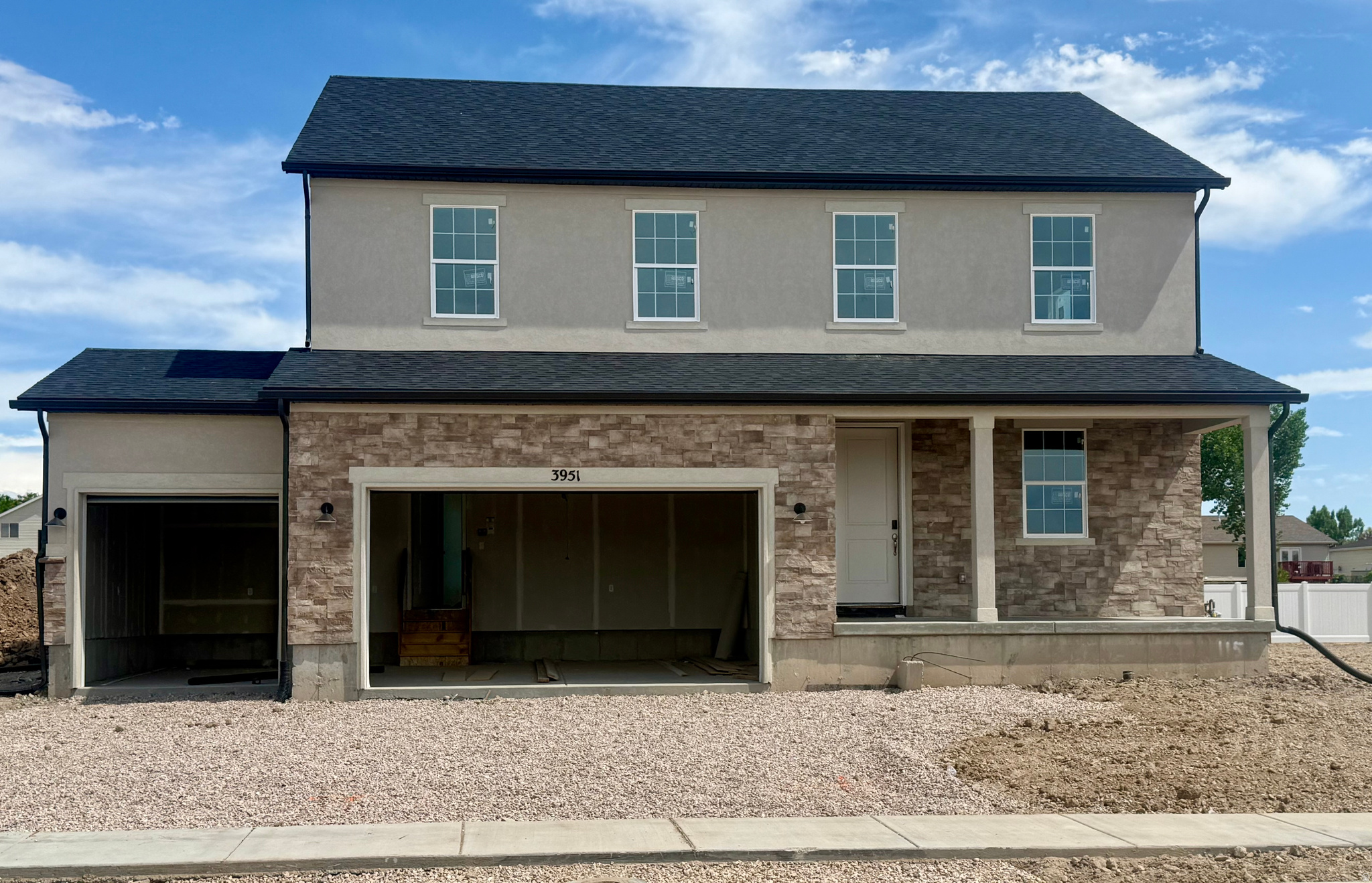 THIS HOME QUALIFIES FOR OUR SPECIAL FINANCE RATE AS LOW AS 4.999%! Call for details! MOVE IN-READY BY FALL! Construction has now begun on this stunning Two-Story Hemingway home on this .18-acre lot with mountain views & NO back yard neighbors...Just breathtaking views & expansive living spaces. Included will be a 6' white vinyl fence along the back side of the property. Curated designer finishes are standard in this breathtaking two-story home, designed for comfort, entertainment, and adventure. With panoramic mountain views as your backdrop, this home offers an unbeatable combination of elegance and functionality. Step inside the front entry where a large formal family room is perfectly situated. A massive entertaining space towards the back of the home where you can upgrade to a gourmet kitchen with top-tier appliances such as a gas cooktop and double ovens. A spacious island is included which flows seamlessly into the open-concept dining space. Upstairs you will find 4 bedrooms, a spacious loft, and a grand Primary suite with a luxurious tub/shower combo in the bathroom. Whether hosting gatherings or love enjoying quiet evenings, this home is designed for making memories. The three-car garage ensures plenty of storage for vehicles, outdoor gear, and more. Surrounded by a quite rural community, you can simply relax while taking in the views, but still enjoy the convenience of nearby shopping and a quick (UNDER 15 minute) commute to Hill AFB.  Don't miss the chance to own this exceptional property where luxury and country living come together in perfect harmony! Schedule a tour today! Buyer to verify square footage. It is provided as an estimate and as a courtesy only. YOU CAN ALSO COME BUILD YOUR DREAM HOME WITH US! We are able to CUSTOMIZE homes in the Beautiful Smith Ranch Subdivision. Build with us and receive up to 4% in flex funds (instead of a Special Financing Rate)! Some restrictions may apply. Call and ask about our Build to order incentives. Price for this home is the total purchase price, including Base Price AND Lot Premium as well as many standard and additional upgrades! More models in varying price ranges available!
