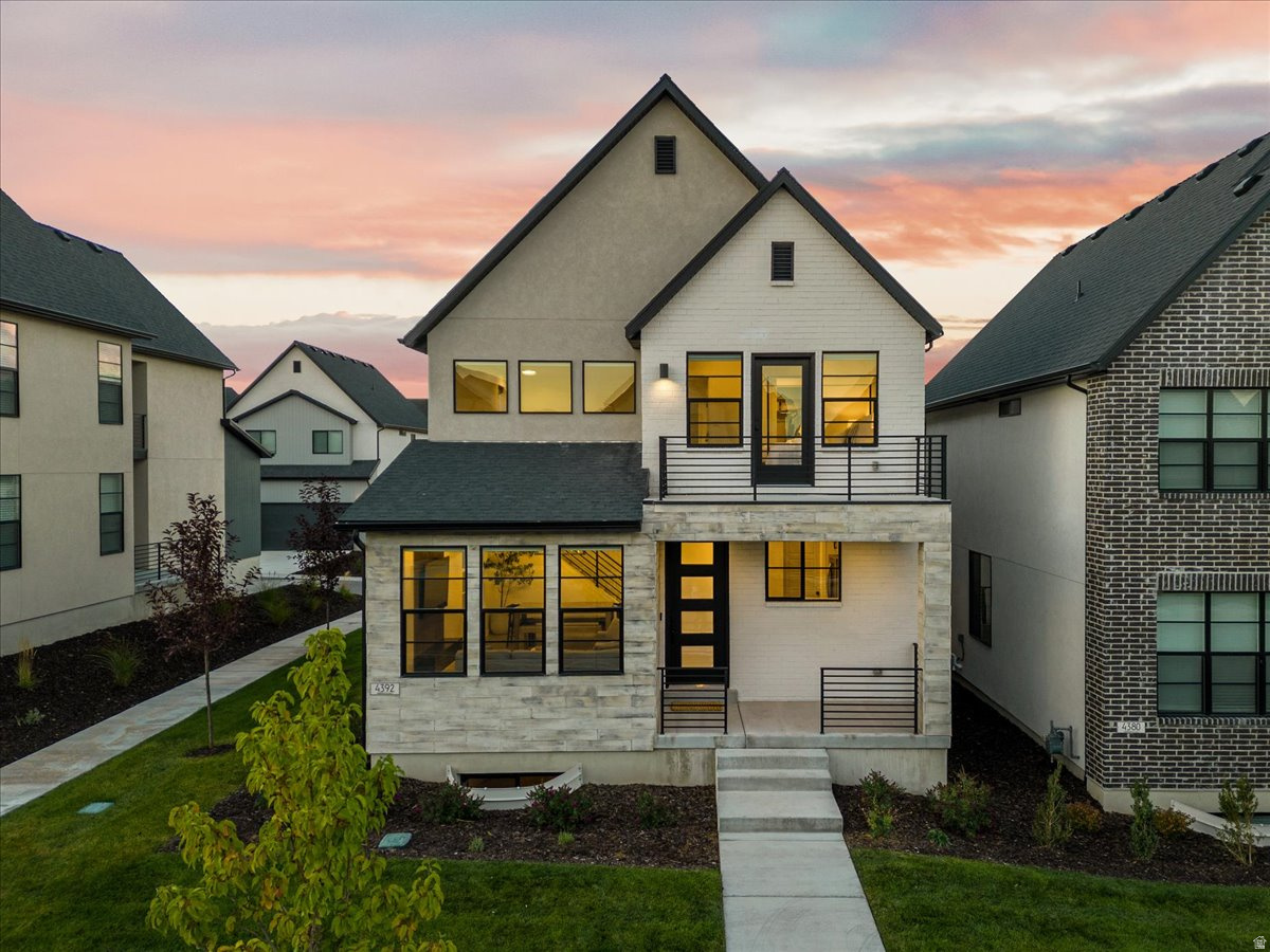 IMPROVED PRICING AND $5000 SELLER CONCESSIONS!!! Tucked in the heart of Lehi - recently named one of the best small cities to live in the U.S. This immaculate Scandinavian-style home blends modern design with everyday comfort. The minimalist aesthetic is paired with beautiful upgraded lighting and hardware, creating a space that feels both stylish and welcoming. Inside, you'll find three spacious bedrooms, a big loft, custom accent walls throughout  that add character, and an unfinished basement ready for your personal touch. The home also includes a water softener and epoxy garage flooring for durability and easy upkeep. You'll also appreciate the thoughtful upgrades throughout, including high-end custom blinds that elevate both style and privacy. The kitchen and laundry are move-in ready with a refrigerator, washer, and dryer, all purchased in 2024, adding convenience and value from day one. Location is a major highlight, you're just minutes from Traverse Mountain with its shopping and outlets, and about the same distance to Costco and Harmons Grocery. A new Smith's Food and Drug is also currently being built just a couple of minutes away, adding even more convenience. Commuting is easy with quick access to Mountain View Corridor (SR-85) just moments from the home, offering a direct route toward Salt Lake City. You're also about 10 minutes from Interstate 15 (Veterans Memorial Highway), making travel north to Salt Lake or south toward Las Vegas simple and convenient. Even better, the HOA takes care of landscaping and snow removal, making maintenance simple year-round. Homeowners in the Ivory Scandinavian community also enjoy access to a private clubhouse and pool, perfect for relaxing and connecting with neighbors. If you're looking for a modern home with clean design and low-maintenance living, this one is truly special.