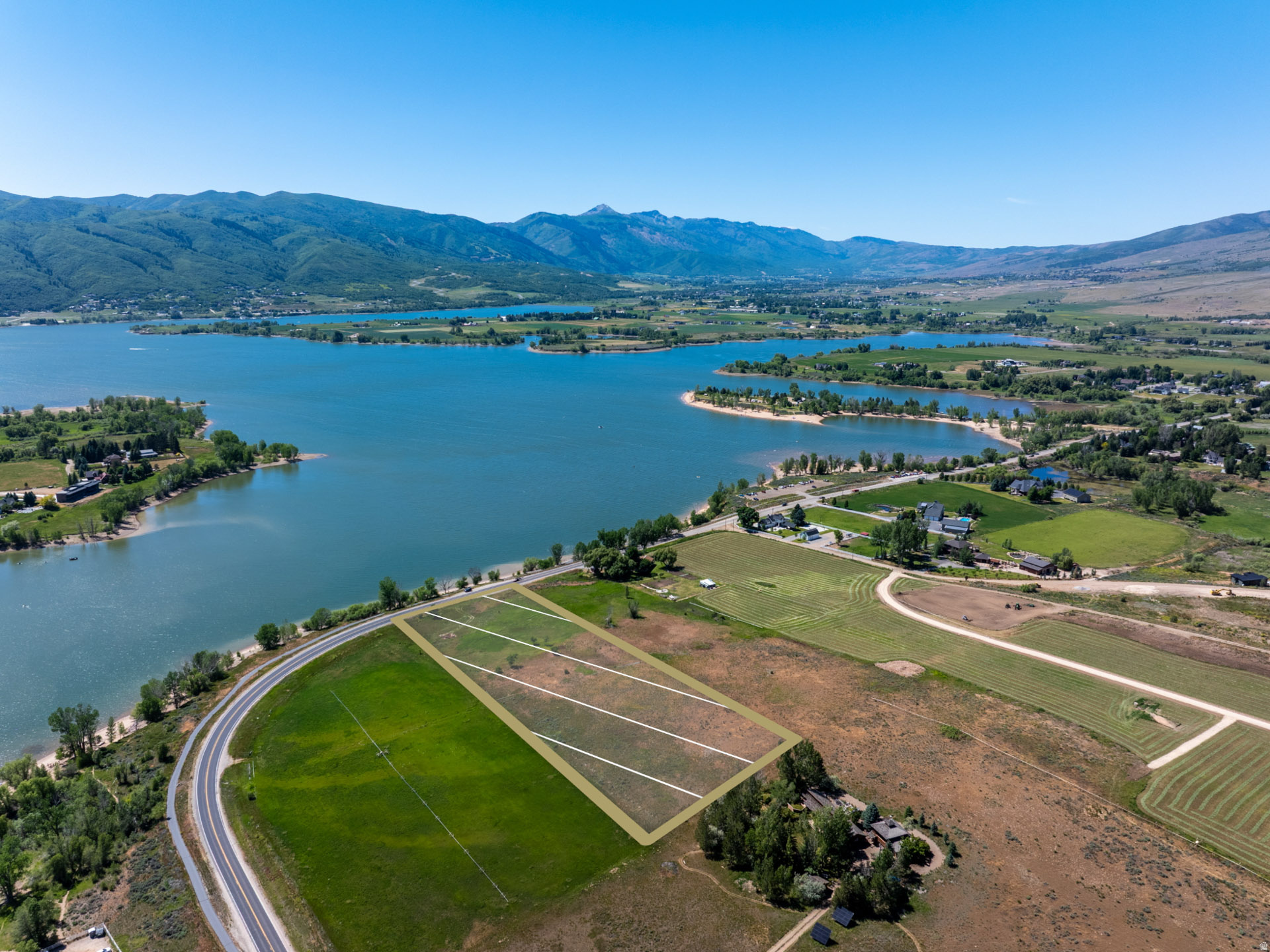 Rarely does a property offer this much space, privacy, and scenery in one setting. Spanning 5 acres, this exceptional homesite captures sweeping views of the reservoir, surrounding mountains, and open valley below. Whether it's the reflection of the water at sunrise or the changing colors across the peaks at sunset, the backdrop is nothing short of spectacular. With ample room to create your vision while enjoying the peace and freedom that come with acreage, this is a setting that feels worlds away yet remains convenient to year round recreation and nearby amenities. Properties with this combination of usable land, panoramic views, and natural beauty are increasingly difficult to find, making this a truly special opportunity to build something extraordinary.