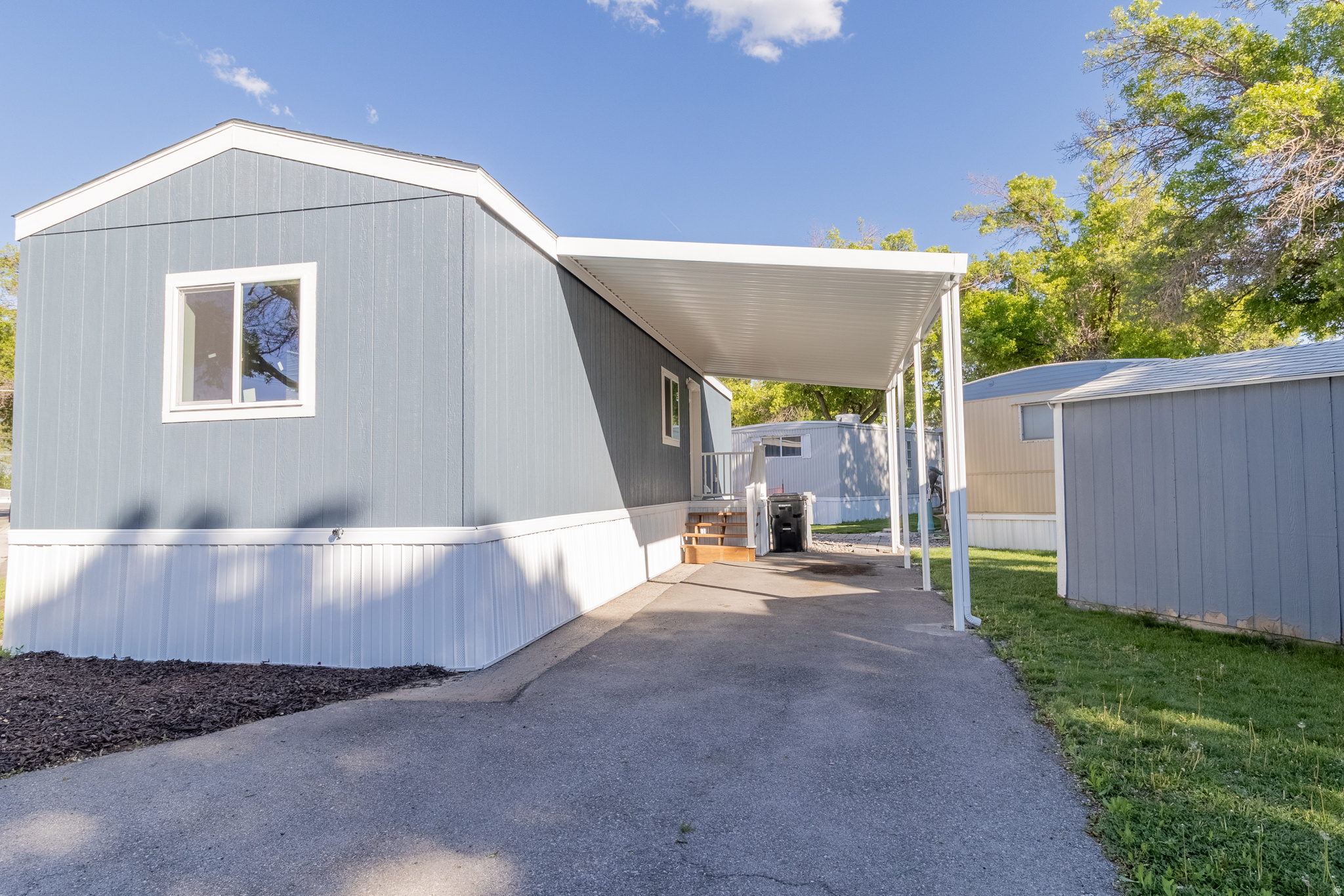 Rare opportunity: brand-new 2025 manufactured home, never occupied, in the established 55+ community of American Heritage in West Valley City. Modern layout, central A/C, covered parking, and storage shed, everything new, nothing to fix. Monthly HOA of $780 covers gas, water, sewer, and trash. Seller is offering 6 months of free lot rent equivalent as an incentive, applied bi-monthly throughout the first year significantly reducing your cost of entry. Seller financing options available. Age requirement: one resident must be 55+, all others 18+. Community approval required prior to contract.