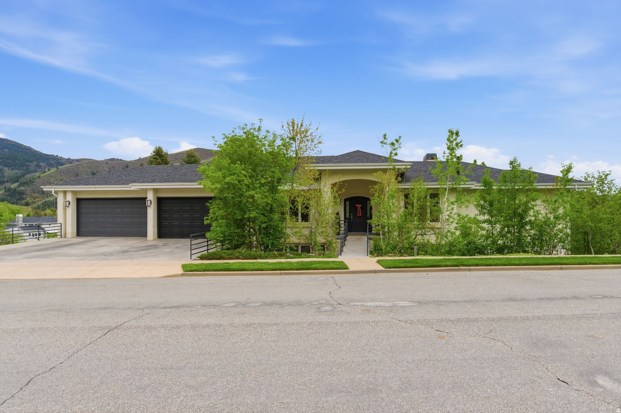 Spectacular home in the Ridges subdivision.  Breathtaking views of Mueller Park Canyon the valley.  This home is loaded with all of the amenities that you could ask for-swimming pool, 2 pickleball courts, indoor basketball court, home theater, second kitchen, BBQ kitchen out by the pool, 4 car garage upstairs with an additional 4 car garage underneath. Main floor living with the primary bedroom/bathroom, kitchen family room, office and laundry room all on the main floor. Did I mention the view! You've got to see the view for yourself. . Minutes from two great golf courses, very close to spectacular mountain biking and hiking trails. Only 15 minutes from downtown Salt Lake City and the International Airport.