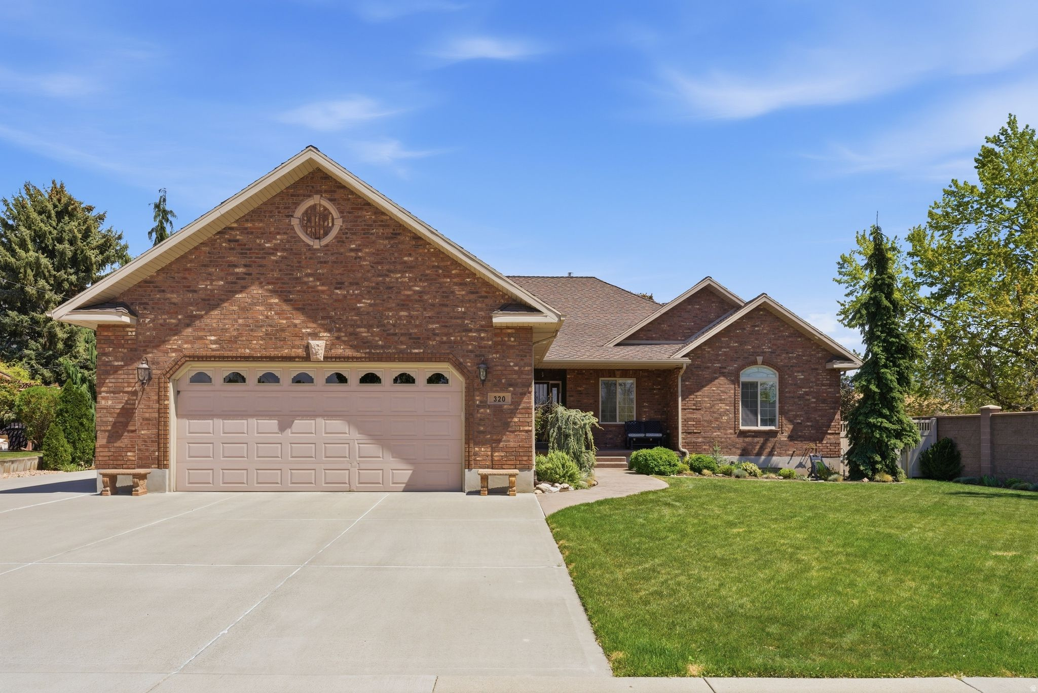 Stunning custom home in American Fork, perfectly positioned on a generous lot with west facing afternoon shade and stunning mountain views. Every detail speaks to meticulous craftsmanship with beautiful finishes throughout, a heated primary bathroom floor, and full brick fencing that frames the property with elegance. The covered deck is ideal for evening relaxation with views of the mountains, and you're near Fox Hollow Golf Course. Ideally positioned for both privacy and accessibility, with easy freeway access, close to American Fork Canyon and the hospital. A full basement apartment with its own kitchen, RV parking, exceptional landscaping, and meticulous care throughout make this home check every box.