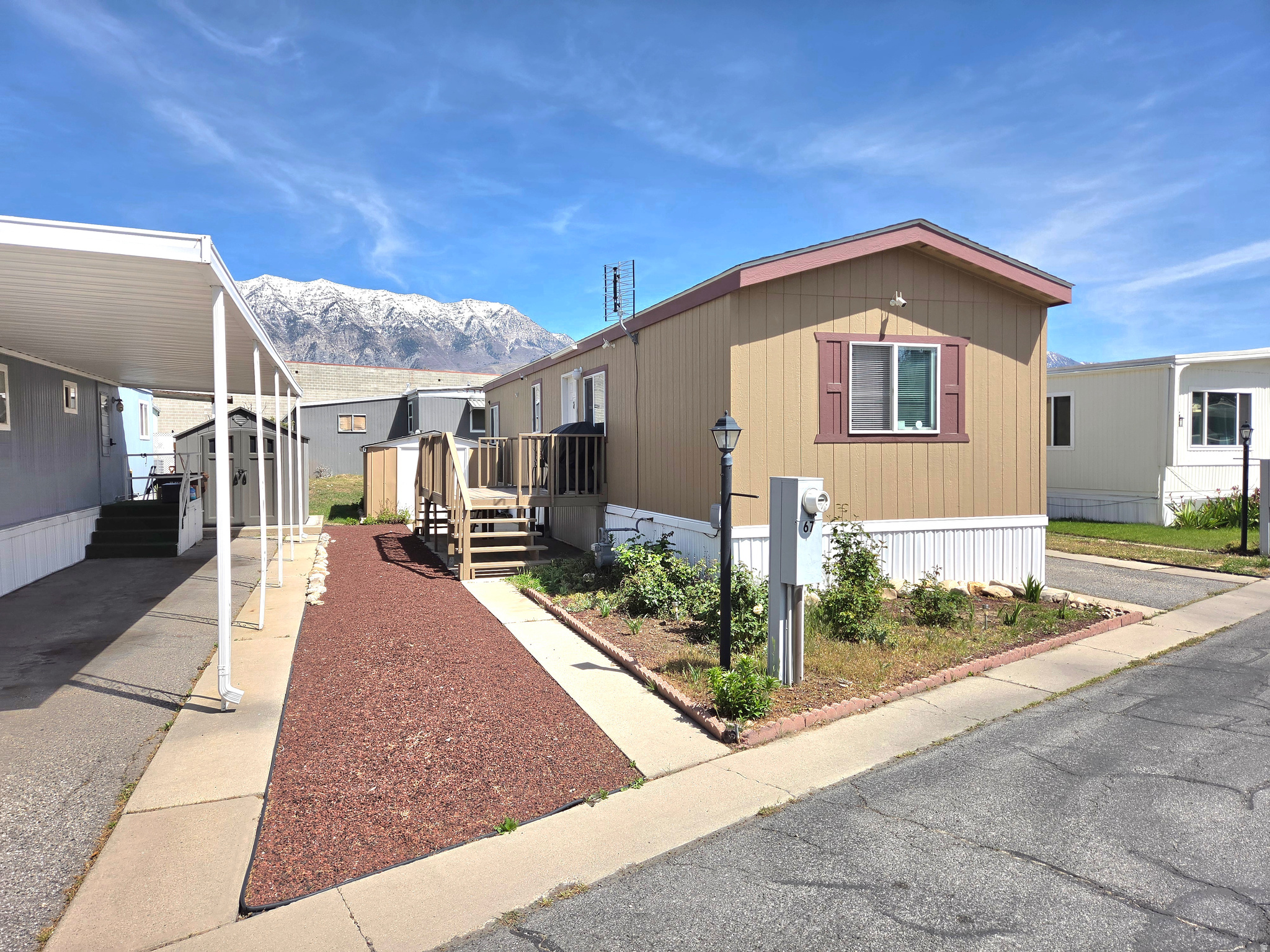 Beautifully maintained home in central Orem location! This property is in excellent condition and offers a rare opportunity with a monthly Park Fee Under $600-an increasingly hard-to-find value. Newer AC unit installed in 2022. Conveniently located near shopping, dining, and major routes, this home combines affordability, comfort, and accessibility. Refrigerator and security cameras included. Access to the Community Pool included with the park fee. IMPORTANT: The monthly park fee will be $540/mo starting in July 2026.**All information provided is deemed reliable, but is not guaranteed and should be independently verified by buyer and buyer's agent. Square footage figures are provided as a courtesy estimate only and were obtained from an appraisal. Buyer is advised to obtain an independent measurement.