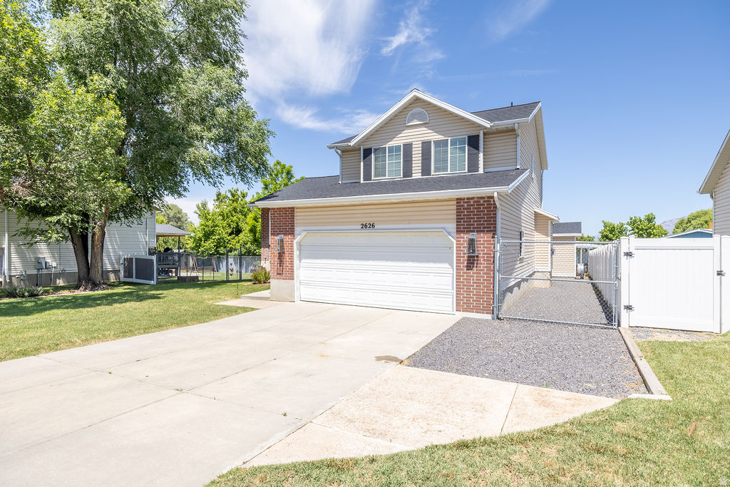 Charming Home in a Quiet, Convenient Neighborhood This is an inviting home nestled in a peaceful, wellestablished neighborhood. Perfectly located, this property offers the best of both convenience and tranquility. Enjoy quick access to shopping, dining, the Ogden airport, Roy front runner station, UTA park 'n ride, and I-15, all just minutes away. Outdoor enthusiasts will appreciate the nearby walking and biking trails, while book lovers and families will enjoy being close to the local library. Inside, the home offers a comfortable layout with bright, welcoming spaces-ideal for relaxing, entertaining, or simply enjoying everyday living. Outside you will find a fully fenced backyard with a bordered garden area, sandbox, mature trees, playground, large patio and a 10X10 shed.