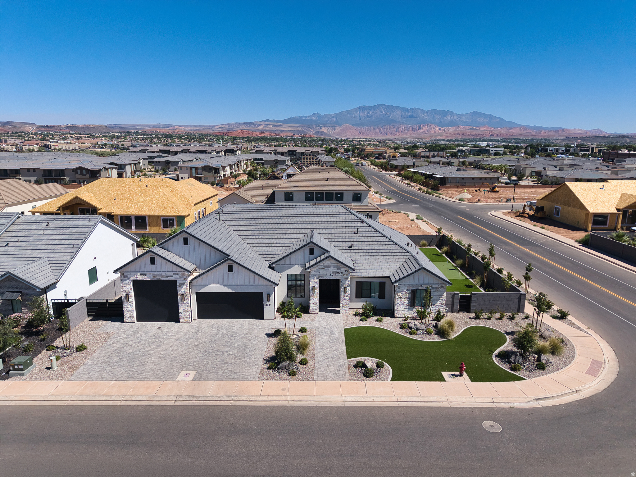 Beautiful single-level home in the highly sought-after Moorland Park neighborhood! Situated on a private corner lot, this exceptional home offers a bright, open floor plan with expansive picture windows and soaring 10' -13' ceilings that fill the home with natural light. Every bedroom features its own en suite bathroom, providing comfort and privacy for family and guests. The spacious primary suite is a true retreat with a luxurious bathroom and custom walk-in closet. The gourmet kitchen is designed for both everyday living and entertaining, featuring a premium appliance package, built-in refrigerator and freezer, oversized walk-in pantry, custom cabinetry, quartz countertops, and designer finishes. Quality craftsmanship is showcased throughout with rich hardwood flooring, stunning millwork, gorgeous tile work, and thoughtful upgrades at every turn. The RV garage features durable epoxy floors, while the beautifully landscaped backyard offers large artificial turf areas, elegant iron gates, a cozy fire pit, and a fun mini golf area. Additional highlights include a paver driveway and patio, creating exceptional curb appeal and outdoor living space. This remarkable home combines luxury, style, and functionality in one of the area's most desirable neighborhoods.