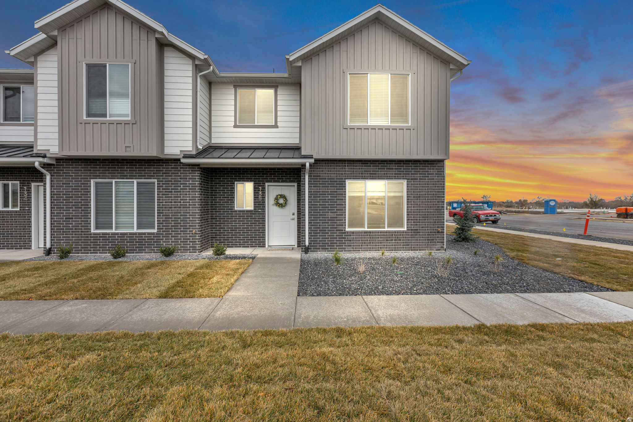 Model home is open 12-4pm Tuesday-Friday Brand New Townhome Subdivision  Thoughtfully designed, each home features an open-concept kitchen with an island, soft-close cabinets, high-end granite countertops, and elegant pendant lighting. The spacious primary suite offers a relaxing retreat with a custom-built window seat and shelving, a luxurious bathroom with a full tile surround shower, separate garden tub, double sink vanity, and a large walk-in closet. Additional highlights include a built-in desk-perfect for remote work, an accent wall in the living room, and a fully finished 2-car garage. Limited-Time Incentive: Use our preferred lender and receive a FREE fridge, window blinds, and $10,000 in concessions that can be applied toward closing costs or an interest rate buydown
