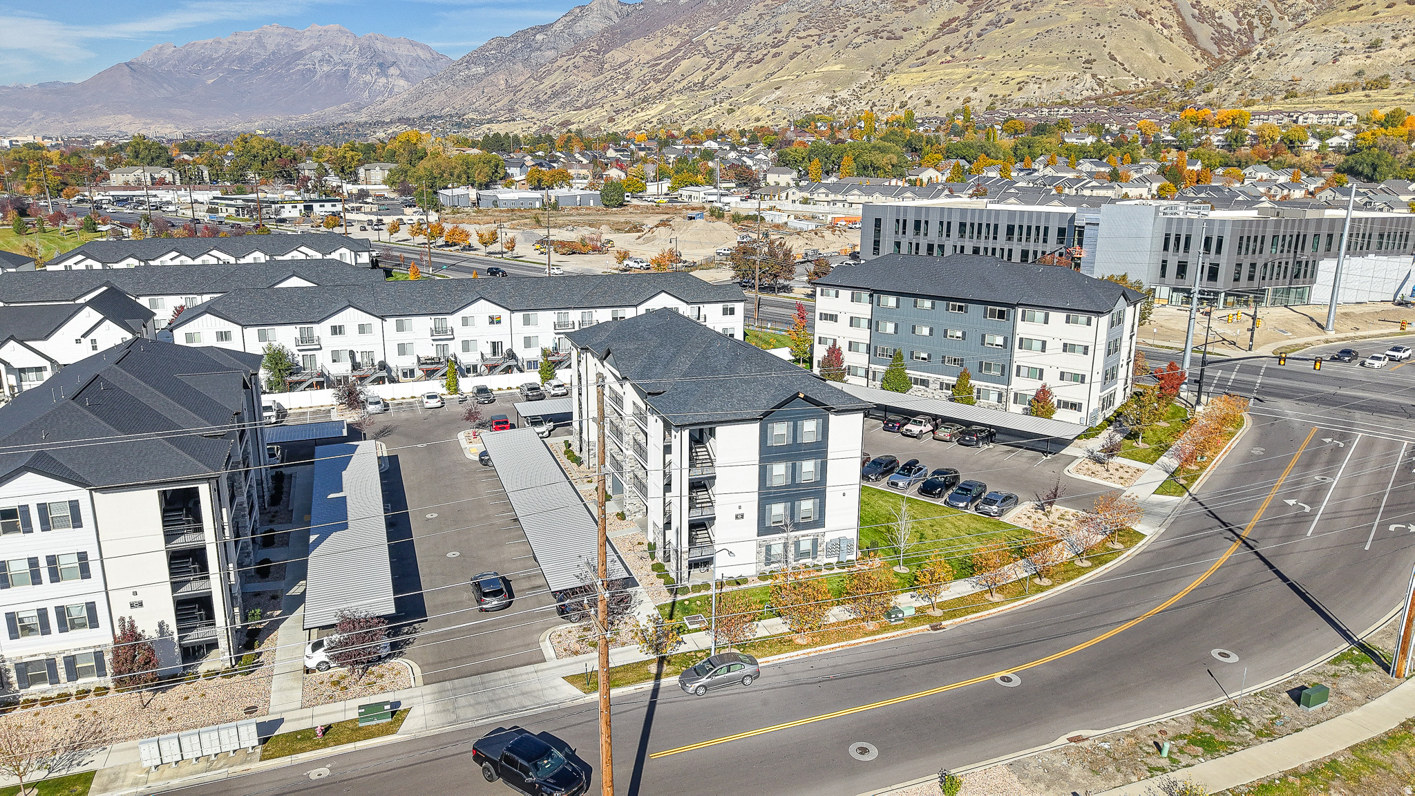 NEW PRICE REDUCTION !!  Check out the 3D Tours at the top! Motivated sellers.  These sleek, modern 2-bed, 1-bath condos in Provo's Spring Creek community (built 2020-2021) deliver that sweet, low-maintenance life and have been great to the owners. Picture waking up to stunning mountain views that make your morning coffee feel like a postcard-because who needs an alarm when the Wasatch Range is flexing right outside your window? Open layouts, natural light, updated appliances, and HOA-covered utilities keep things easy. Close to BYU, many parks, shopping, trails, and schools-perfect for first-timers, students, or anyone tired of yard work. Move-in ready, mountain-gazing included. Your view just upgraded-don't sleep on it!