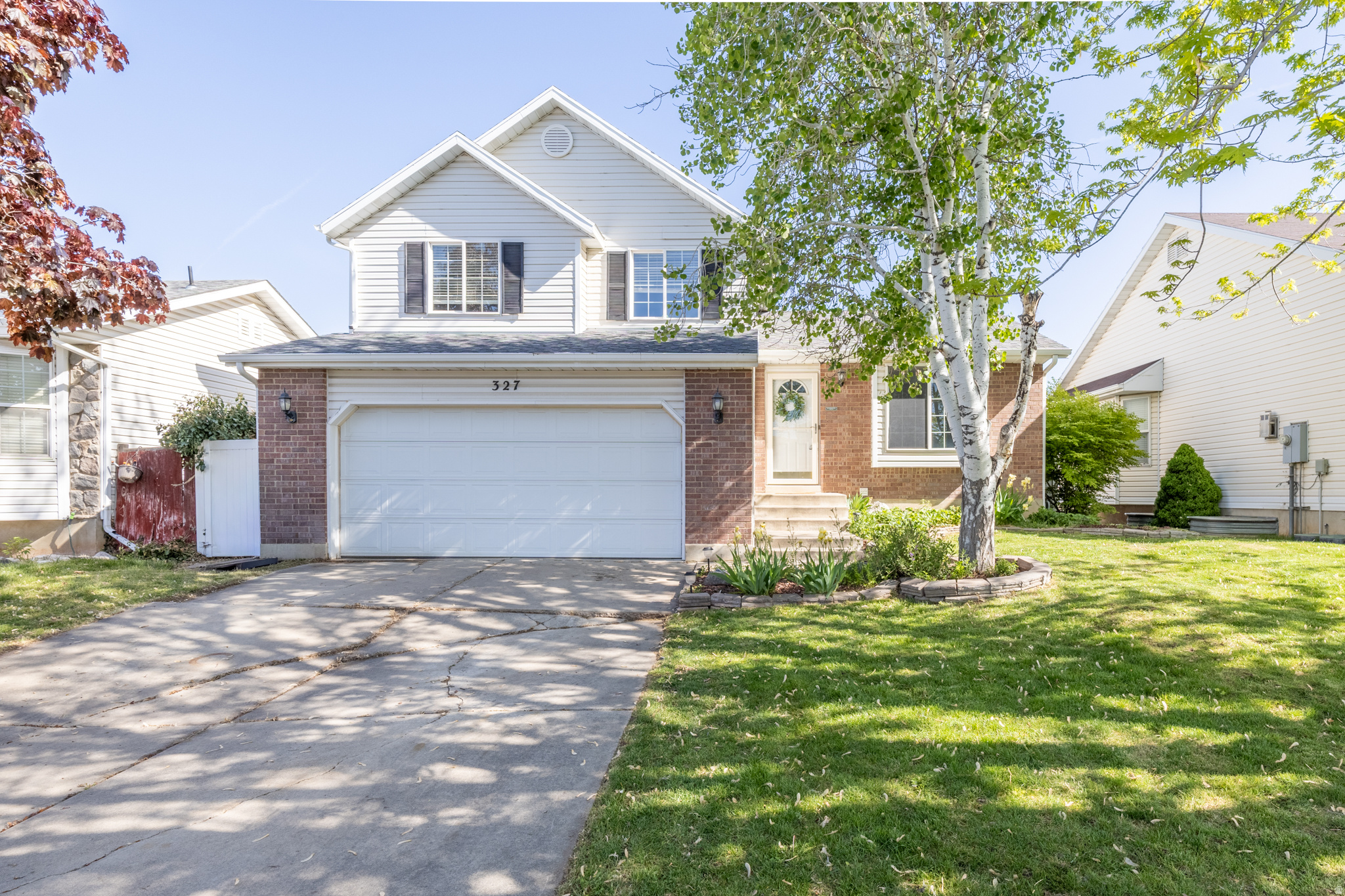 *No Showings until OPEN HOUSE  Saturday MAY 2nd.*  Step into this beautifully updated 4 bedroom, 2 bathroom home located on a peaceful, quiet street. Freshly painted with LVP flooring and new carpet, this home is truly move in ready. The kitchen features  granite countertops, a reverse osmosis system, and the refrigerator is included. Outside is a gardeners dream with a peach tree, a herb garden, and a drip system in the back garden for easy maintenance. Perfectly situated for commuters, you're minutes from HAFB, I-15, and the FrontRunner station, with Steed Park just a stroll away. The basement is already framed for a 5th bedroom and plumbed/framed for a 3rd bath. Schedule your tour today!