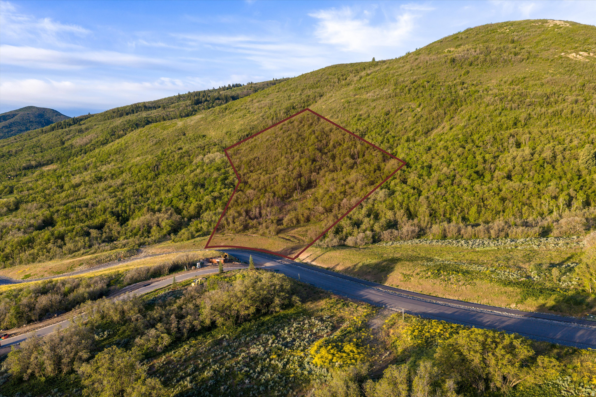 Osprey Ranch Lot 10 offers a rare opportunity to own a fully improved 4.06-acre homesite with breathtaking panoramic views of Pineview Reservoir and the surrounding mountain peaks, complete with water and sewer connections already in place. Set within one of Ogden Valley's most coveted mountain communities, this exceptional property combines privacy, expansive acreage, and a truly unforgettable setting for a custom legacy home designed to embrace year-round indoor and outdoor living. Enjoy four seasons of recreation right outside your door, from boating, paddleboarding, and beach days at Pineview Reservoir to hiking and mountain biking along scenic Osprey Ranch trails. In the winter, world-class skiing and snowboarding await just minutes away at Powder Mountain, Snowbasin, and Nordic Valley. With completed infrastructure, stunning natural beauty, and endless recreation nearby, Lot 10 presents an extraordinary opportunity to create your dream mountain retreat. Boundary lines are provided as a courtesy estimate only. Buyer is advised to obtain independent measurements.