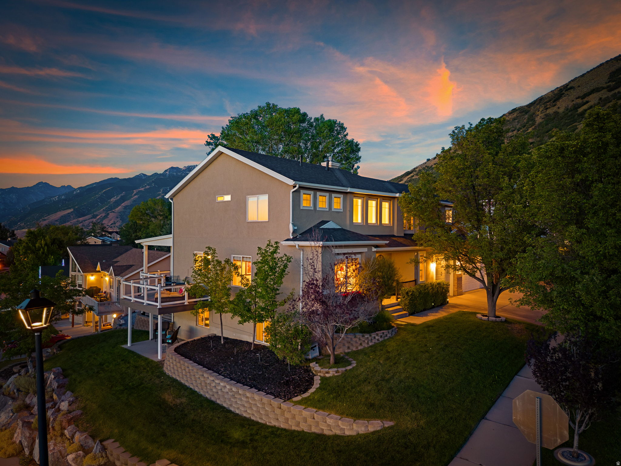 Welcome to this beautiful Draper home with expansive unobstructed valley and mountain views. This six bedroom, three and a half bath home has an open floor plan that shines with natural light. The basement level includes two bedrooms, a full bath and a second kitchen ideal for guests, multi- generational living, or rental potential.  Stunning indoor-outdoor living spaces with two expansive decks and an outdoor grilling space.  Large extended three car garage (25' deep by 30' wide). Well cared for, thoughtfully updated, and move in ready. A mile away from the Salt Lake County Flight Park. The Square footage figures are provided as a courtesy estimate only and were obtained from a previous listing.