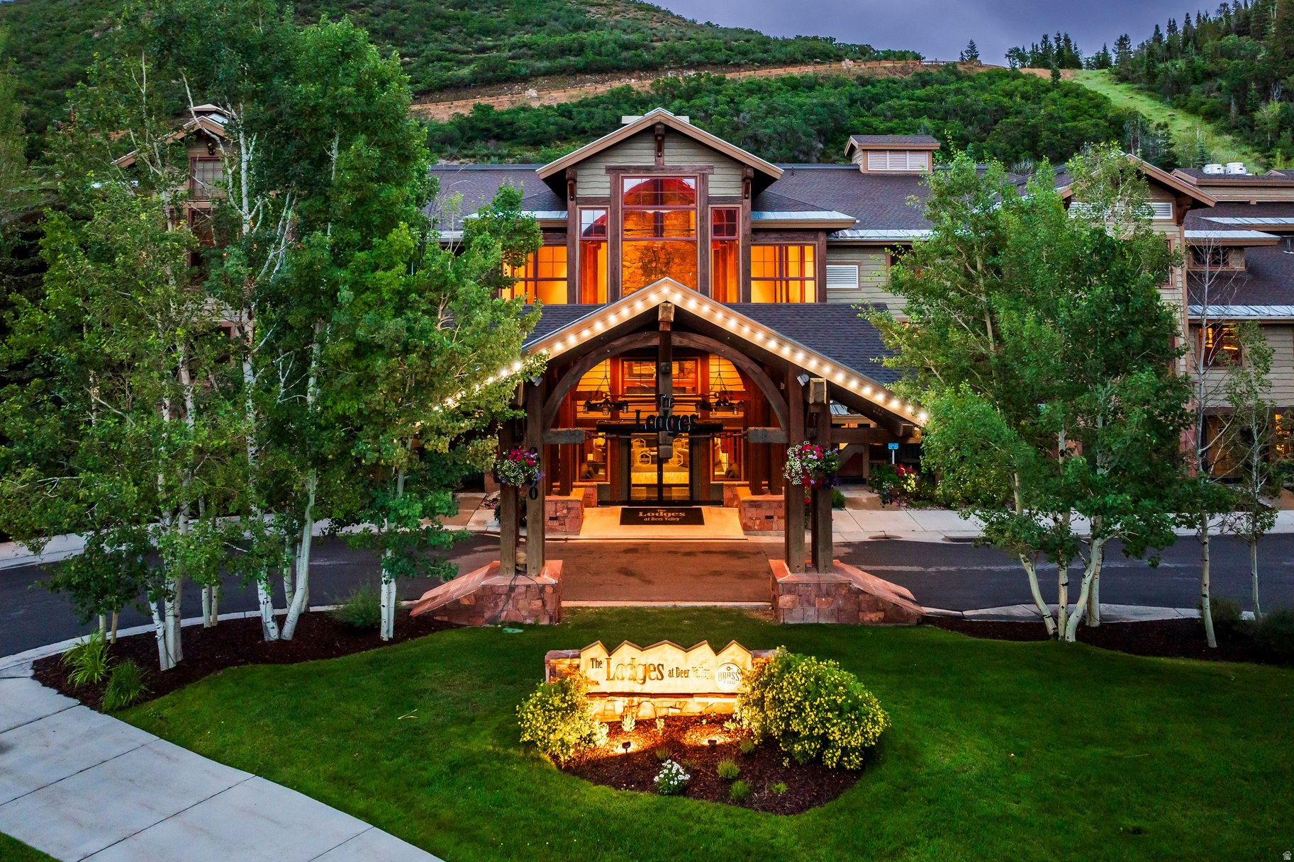Beautifully remodeled, this Lodges at Deer Valley residence is set adjacent to open space, offering a private, serene setting with sweeping Deer Valley ski run views. Showcasing a refined mountain-modern finish, the property features multiple lock-out capabilities suited to a variety of use and rental scenarios, offering an ideal combination of investment potential and personal enjoyment.  Perfectly positioned within the community, this residence is just steps from the year-round heated pool, hot tubs, and fitness center, providing effortless access to the property's premier amenities.  The Lodges at Deer Valley delivers unparalleled amenities, including a newly renovated owner's lounge, on-site general store and restaurant,The Brass Tag, along with dedicated concierge services. Residents enjoy a full breakfast buffet daily during ski season, on-demand ski shuttle service to and from Deer Valley's various ski lodges. The Lodges also offers an app-driven, year-round, private Range Rover car service throughout Deer Valley, along with service to the restaurants, bars, and shopping of Historic Main Street in Old Town.  Whether enjoying winter sports, summer hiking and biking just steps from your door, or Park City's celebrated music and art festivals, The Lodges at Deer Valley delivers an unmatched combination of location, accessibility, and convenience to everything Park City has to offer.