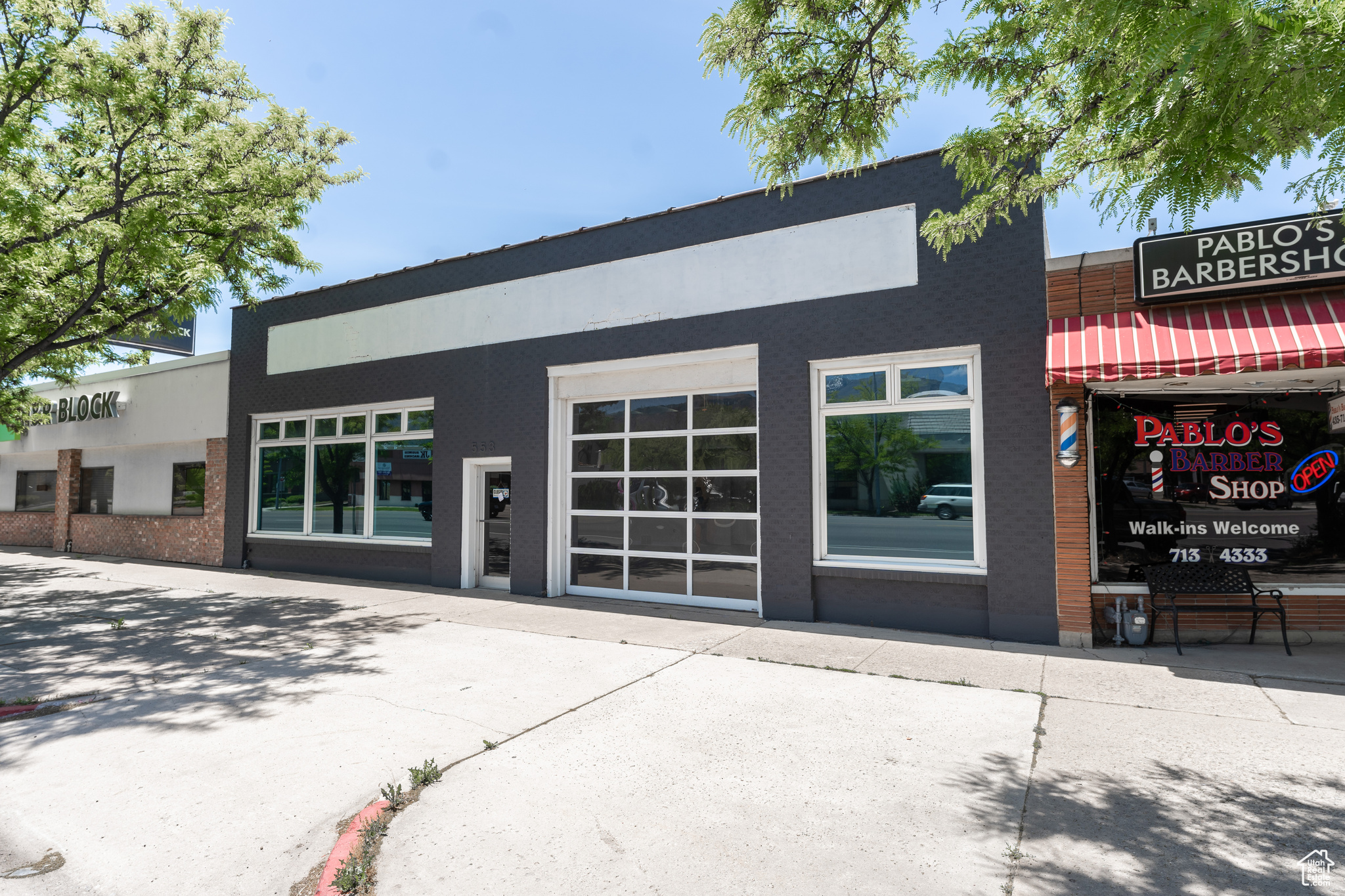 Main street property for retail or office! You don't want to miss out on this amazing space in the perfect location for any business. Property has great signage options and 20 stalls of parking in the back, plus customer parking in front on the street. The store front has amazing natural light and wide open spaces. Previously Millers Northern Utah Glass Store and Jump the Moon and The Boys and Girls Club of Northern Utah. Space is available immediately. Ask about build out options.