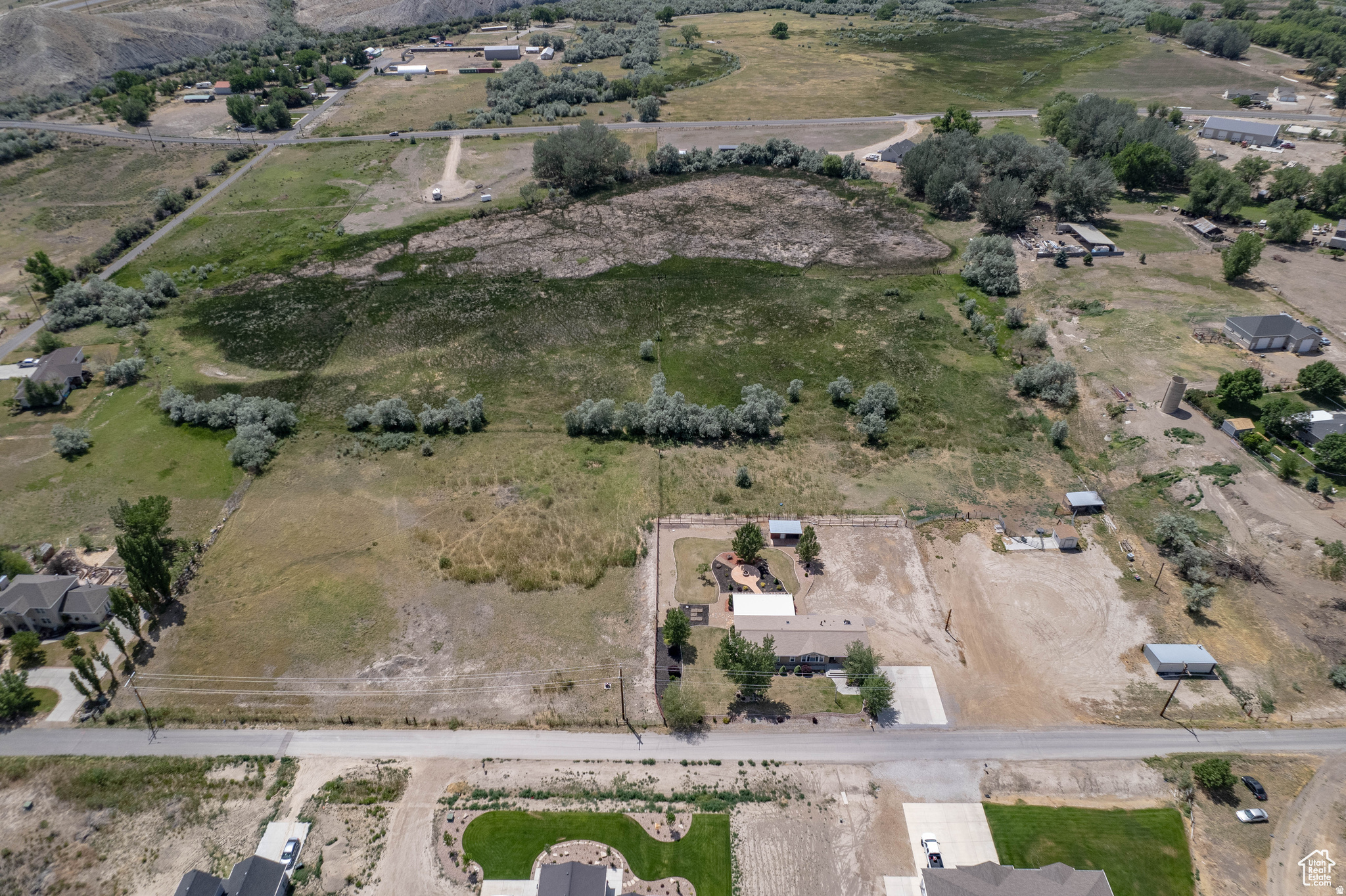 Build Your Dream or Invest in the Future! Don't miss this exceptional 2.15-acre building lot located just minutes from Price. This property is uniquely positioned for both immediate use and future potential; while currently a peaceful setting for a custom home or hobby farm, its proximity to commercially zoned property may open the door for a future re-zone. The lot is build-ready with PRWID sewer and utilities already on-site. Per Carbon County records, the land is located outside of flood zones/flood ways. Bring your horses and enjoy the mountain views, or capitalize on the location's growth potential. Buyer to verify all zoning possibilities and requirements with Carbon County planning and zoning Square footage figures are provided as a courtesy estimate only and were obtained from _County Records . Buyer is advised to obtain an independent measurement. Buyer to verify all zoning possibilities and requirements with Carbon County planning and zoning