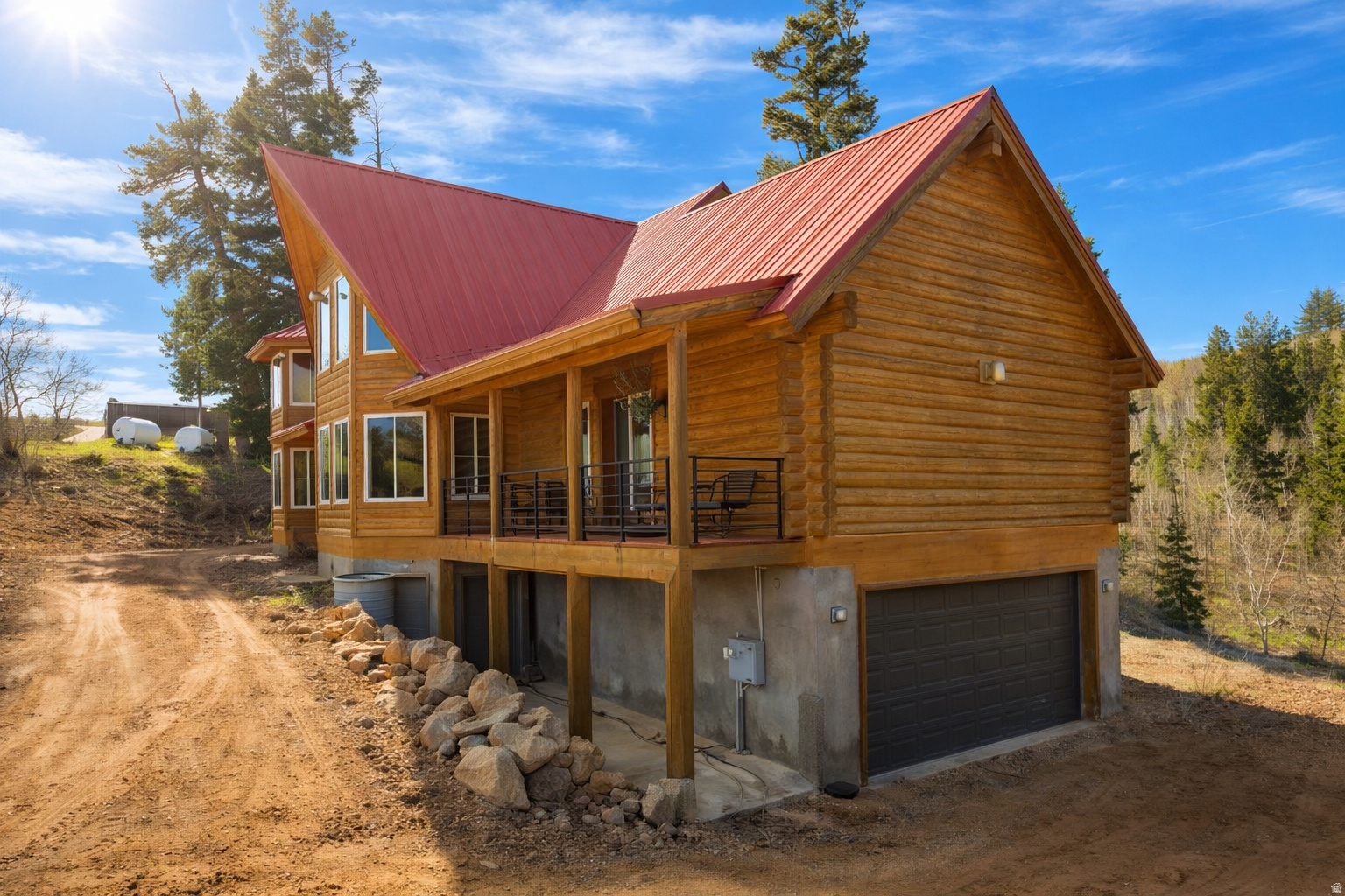 This custom-crafted log home in Pine Meadow Ranch combines classic mountain architecture with solid infrastructure and yearround functionality. Recent improvements include remodeled decks and railings, plus a reinforced foundation designed to support the weight and longevity of the home's massive log construction. Inside, the main level offers an efficient open layout anchored by a kitchen built for serious use. A Viking Range provides professionalgrade cooking capability, complemented by a new refrigerator and dishwasher. The kitchen also features a newly installed 12foot solidsurface island, offering extensive prep space and seating capacity ideal for hosting larger groups-an excellent advantage for nightly rental use, which is permitted in this area. The home's entertainment layout is equally practical: a dedicated lounging, TV, or ping pong space on the lower level, a mainfloor game area, and multiple zones that allow guests to spread out without crowding. The primary suite includes direct access to a private sauna and soaking tub, adding a valuable amenity for both personal enjoyment and guest appeal. There is even a tree house for the "littles" that like adventure. With yearround access, this property supports fulltime living or fourseason recreation. Winter access requires 4WD and snowrated tires, consistent with mountain living at this elevation. Whether used as a primary residence, second home, or incomeproducing rental, the home is engineered to handle active use in all seasons.
