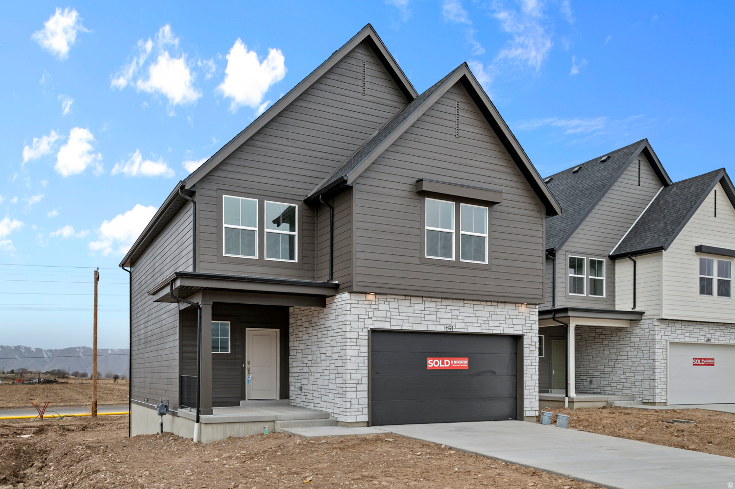 * ESTIMATED COMPLETION SEPTEMBER 2026 Beautiful new Clover floorplan in the Modern Farmhouse style with a 2-car garage. Open-concept living on the main floor with a half bath.  Quartz kitchen and bathroom countertops, laminate flooring, 36" upper cabinets, pantry, coat closet, and unfinished basement for an additional bedroom, family room, and storage.  The second floor has three bedrooms including a master bedroom suite with a bath with shower/tub combo, a walk-in closet, laundry, another full bathroom for the other two bedrooms, and a loft.     ** Special Interest Rates are Available ** with our Builder Forward Commitment (BFC) if you use DHI Mortgage in addition to receiving up to $4,000 toward closing costs.  ****   *Ask me about our 7/6 ARM rate  Ask me about our generous home warranties, active radon Mitigation System, and Smart Home Package, which is included in this home.  The actual home may differ in color, material, and/or options. Pictures are of a finished home of the same floor plan and the available home may contain different options, upgrades, and exterior color and/or elevation style. Square footage figures are provided as a courtesy estimate only and were obtained from building plans. No representation or warranties are made regarding school districts and assignments; please conduct your own investigation regarding current/future school boundaries.