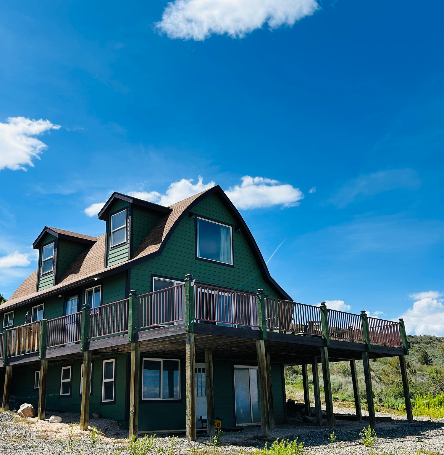 Nestled on over an acre in beautiful Bear Lake, this charming cabin offers breathtaking panoramic lake and valley views from the expansive deck, the perfect place to relax, entertain, and take in the unforgettable sunsets. Set back from the road for added privacy and seclusion, the property provides plenty of space to add a garage, shop, or additional outbuilding. Fully furnished and move-in ready, this cabin is ready for you to begin making memories and enjoying the adventures Bear Lake has to offer year-round.
