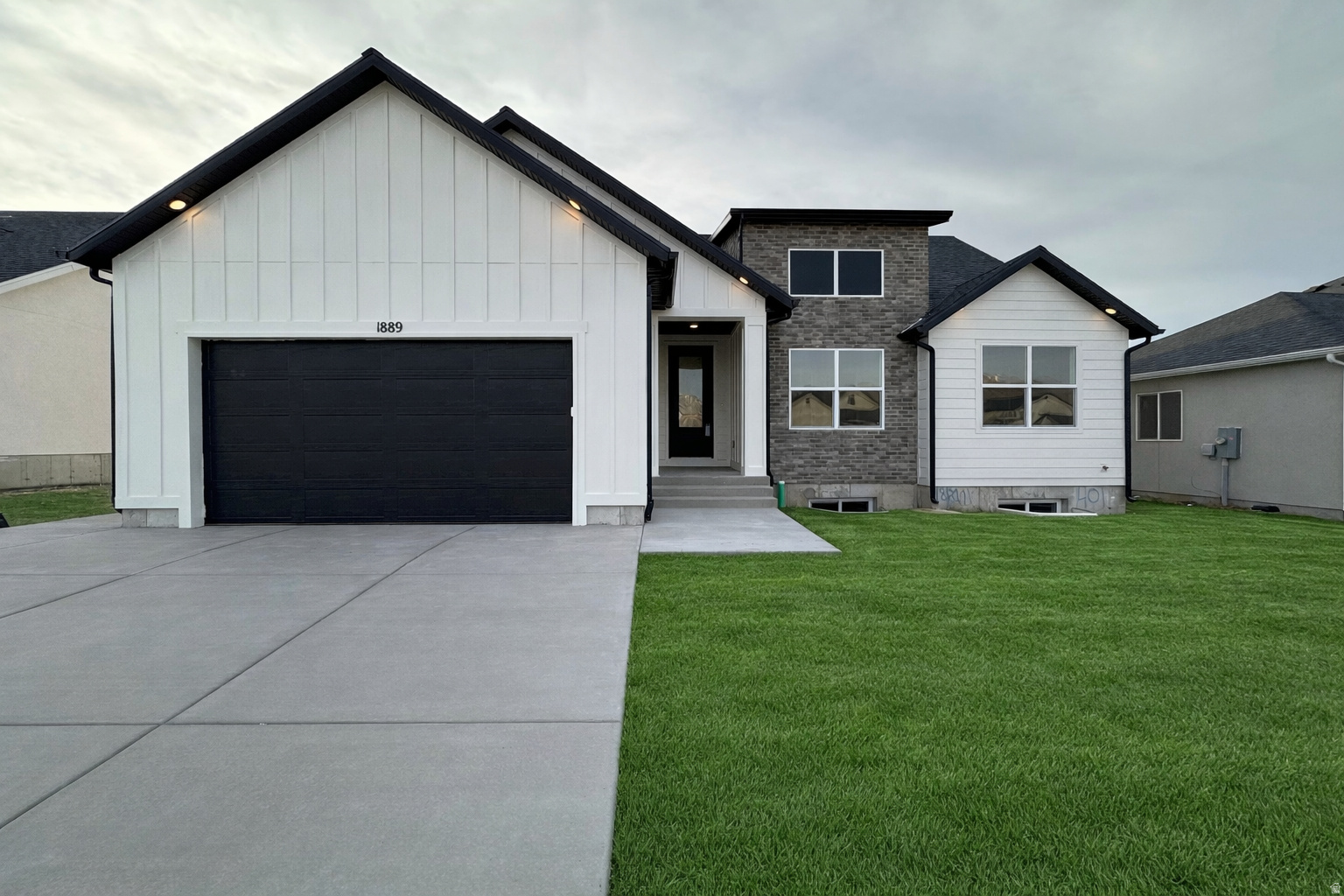 The Chelsea by GTM Builders is now offered with up to $24,000 in incentives! This beautifully designed rambler sits on a .16-acre lot in Tooele and features 6 bedrooms, 3 bathrooms, and a 2-car garage. With 3,181 total square feet, this home includes a 100% finished basement, providing ample space for living, entertaining, or multi-generational needs. Front landscaping is included, adding to the home's curb appeal. A fantastic opportunity to own a spacious, thoughtfully designed home with exceptional value don't miss it!