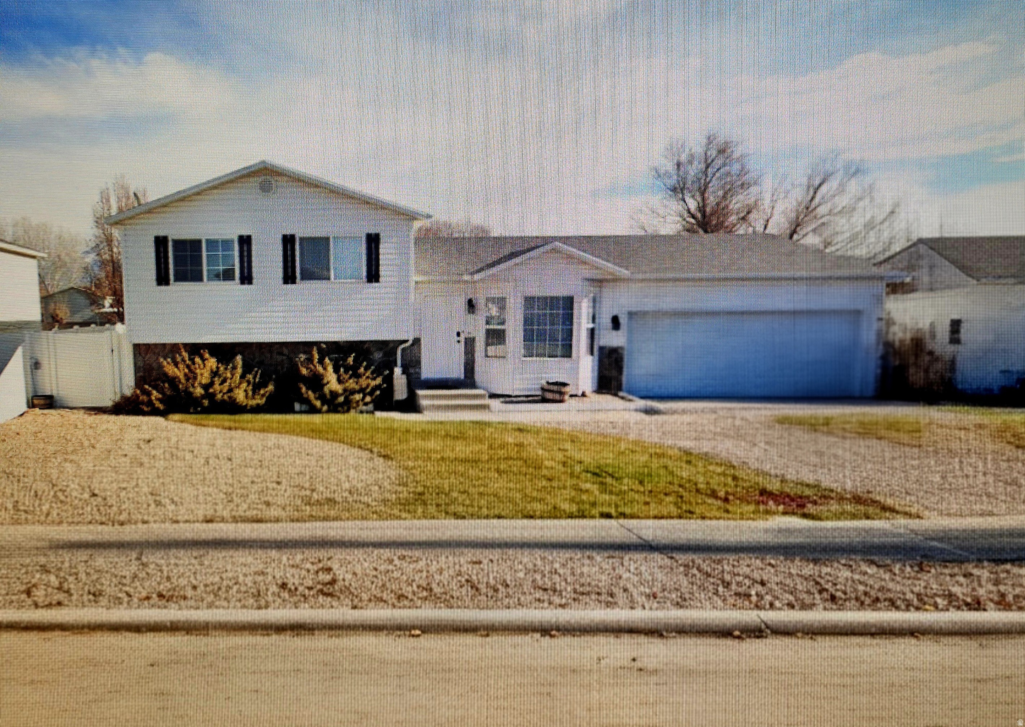Enjoy the perfect blend of comfort and convenience in this Lehi home near Sommerset Park. Take in beautiful Mount Timpanogos views from the flagstone patio and pergola, the perfect spot for morning coffee or summer BBQs. The fully fenced yard offers space for pets, play, and entertaining. Need room for your toys and tools? The property includes an 8' x 16' shop, with an overhead door, ideal for a side-by-side, plus a covered carport and additional storage shed.