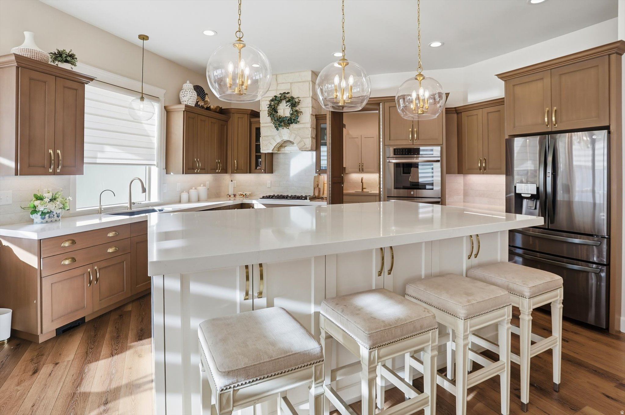 Luxury living at its finest in beautiful Mantua! This stunning home is loaded with upgrades and thoughtful details throughout - from soaring vaulted ceilings and upgraded LVT flooring to a spacious chef's kitchen featuring an oversized island and a fully equipped butler's pantry with sink, disposal, oven, and microwave. Retreat to the luxurious primary suite boasting a cozy fireplace, wrap-around walk-in closet, and spa-inspired ensuite bath. Automated shades in the living room and primary bedroom add comfort and convenience, while the large laundry room with sink and central vacuum system make everyday living effortless. Enjoy a separate entrance from the front porch leading to the mudroom and laundry - perfect for keeping the home clean and organized. The basement is framed and partially wired, ready for your finishing touch, featuring space for two large living areas, three bedrooms, one full and one half bath, plus two cold storage rooms. Additional highlights include dual water heaters and a reverse osmosis water filtration system plumbed to the kitchen. Nestled in one of Utah's most picturesque mountain communities, this home offers the best of peaceful mountain living with easy access to shopping and dining just minutes away. Come see why Mantua is one of Utah's true hidden gems! Square footage figures are provided as a courtesy estimate only and were obtained from County Records . Buyer is advised to obtain an independent measurement.