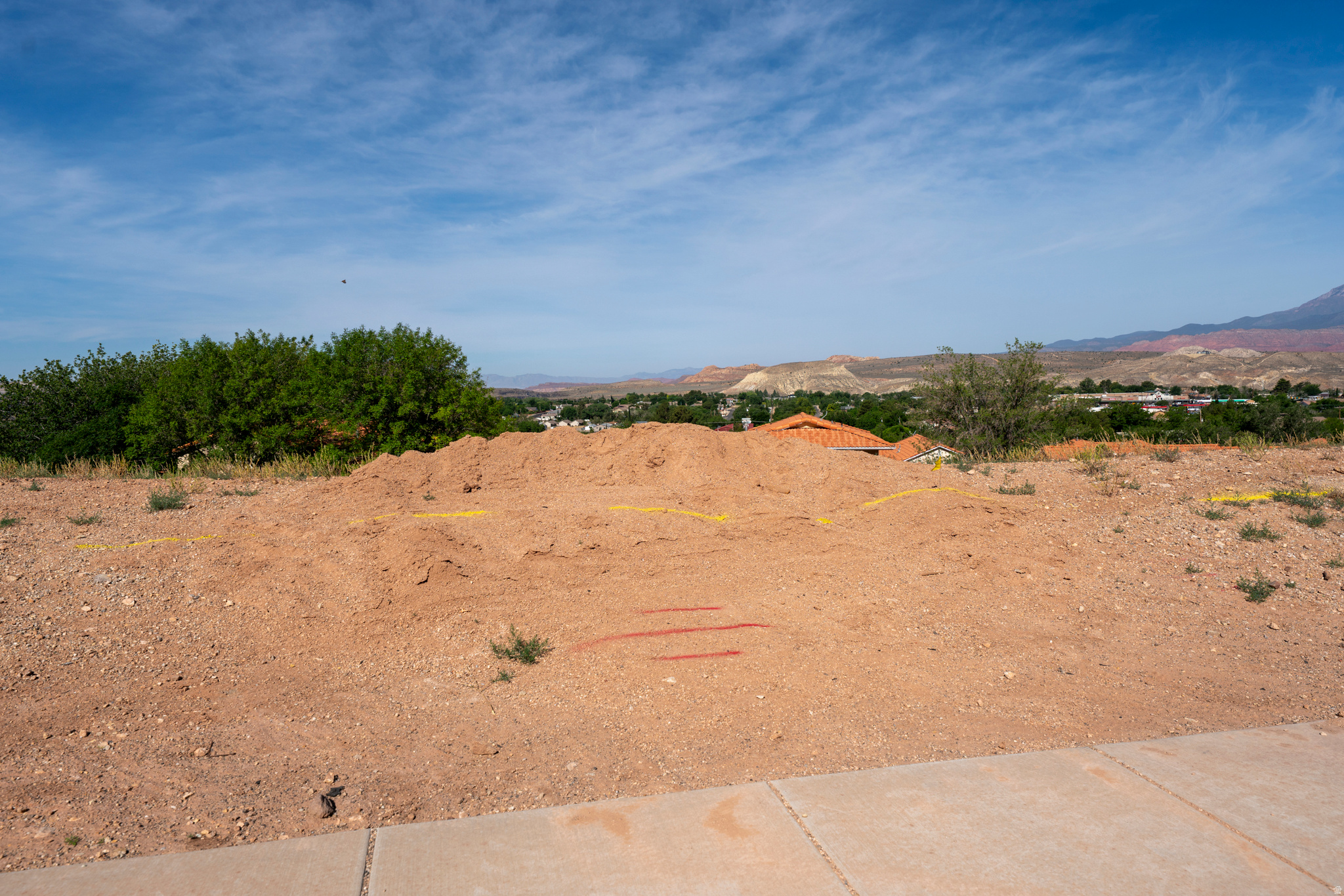 Conveniently located in La Verkin just minutes from Zion National Park, this .23 acre lot has walk-out basement potential. Providing the perfect opportunity to build in Southern Utah without the burden of HOA fees, this affordable building lot has a lot to offer. Tucked into a relaxed neighborhood, you will enjoy sweeping views of the valley and surrounding red rock mesas without paying premium resort prices.