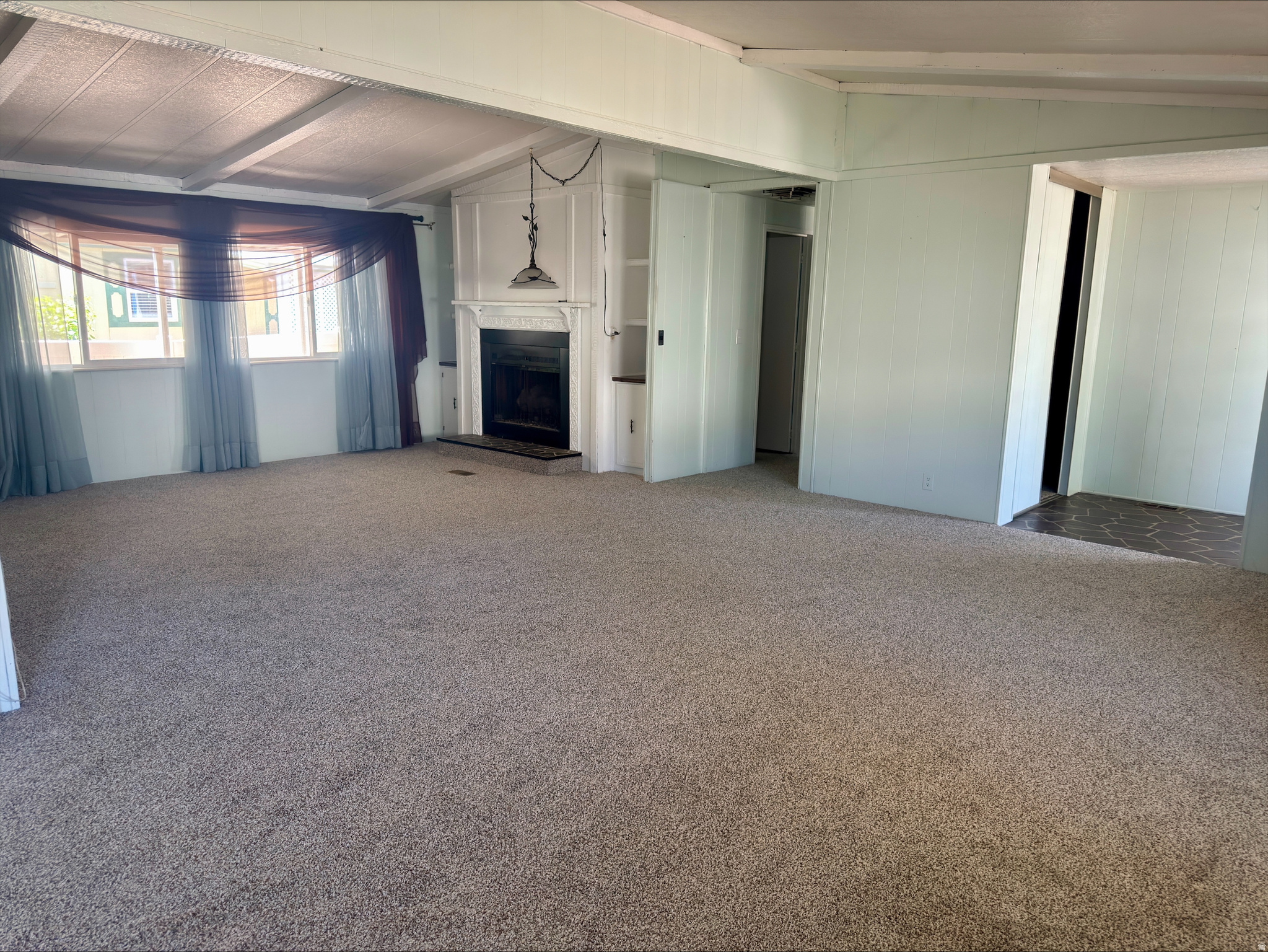 Welcome home to this spacious and inviting 1,799 sq. ft. modular home located in a desirable 55+ community featuring a community pool for residents to enjoy. Offering 3 bedrooms and 2 full bathrooms, this well-maintained home provides comfortable living with a functional floor plan and generous living spaces. Brand-new carpet throughout creates a fresh and welcoming atmosphere, while the cozy fireplace adds warmth and charm to the main living area. Step outside to the covered deck, perfect for relaxing, entertaining, or enjoying peaceful mornings and evenings. With its thoughtful updates, community amenities, and move-in-ready condition, this home is a wonderful opportunity to enjoy low-maintenance living in a welcoming neighborhood.  This is a 55 and older community. One person living in the home must be 55+ and all others must be 45+. All offers are contingent on Westwood Villages approval. Buyer and Buyer's agent to verify all information.