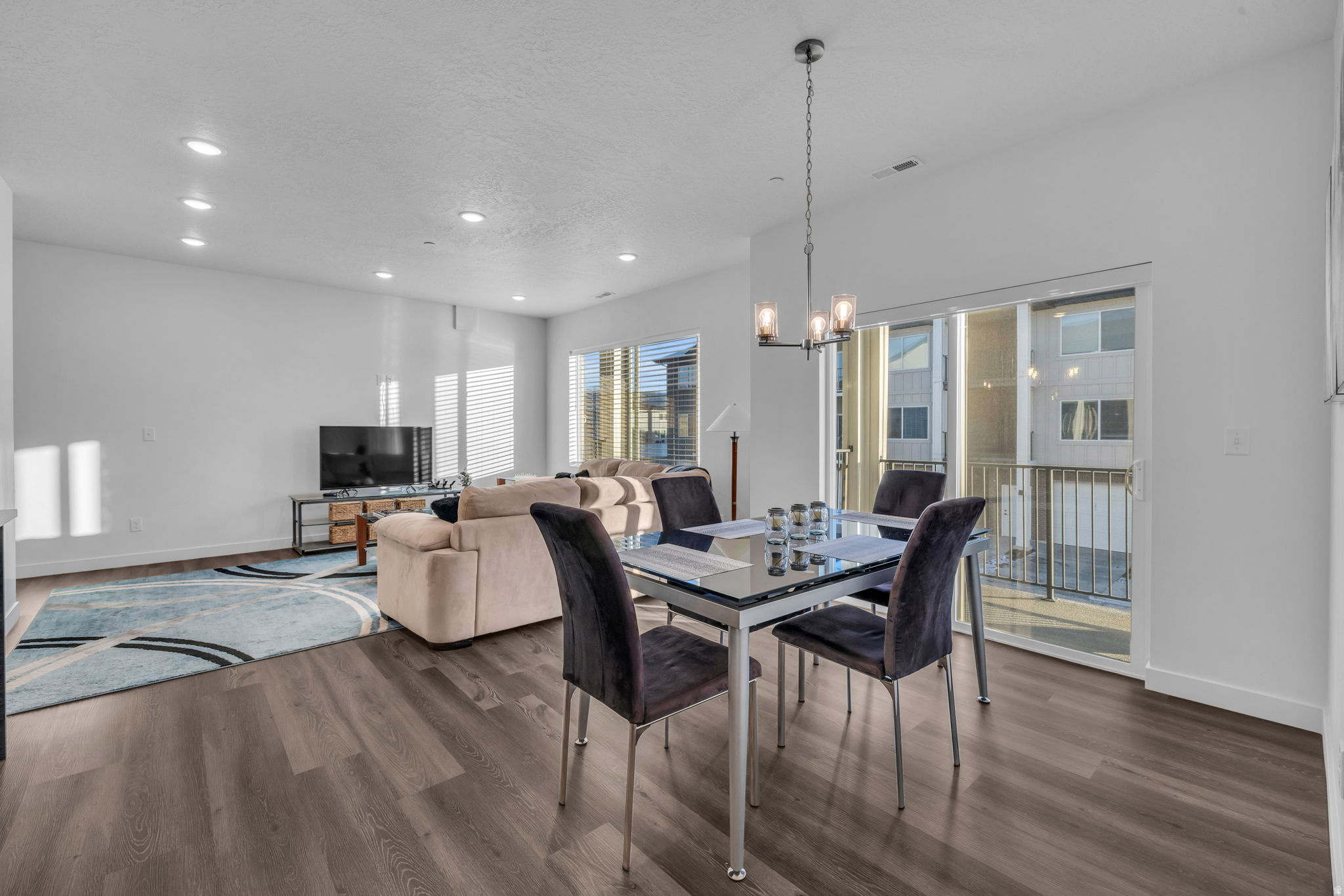 Treat yourself to elevated living in this stylish 3-bedroom, 2-bath condo with views of Mount Timpanogos. With a thoughtfully designed living space, the open-concept layout features upgraded cabinetry, quartz countertops, and beautiful flooring-perfect for both everyday comfort and entertaining. The private garage is pre-wired for an electric vehicle, adding modern convenience to this already exceptional home. Just a short drive to the new Deer Valley East Village or Sundance Resort-without the premium price tag-you'll enjoy easy access to numerous year-round outdoor recreation options including golfing, fishing, boating, and world-class skiing. A pool and clubhouse are coming, enhancing the community lifestyle even further. Whether you're looking for a primary residence, second home, or investment opportunity, this property checks all the boxes and short or long term rentals are allowed. A preferred lender offers 100% financing for qualified buyers. Schedule your private tour today and experience it for yourself! Information provided as a courtesy; buyer to verify all details, including square footage, to their own satisfaction.