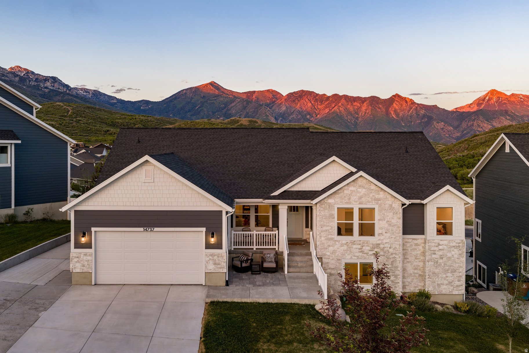 **Grand Open House Saturday June 6th from 11:00-1:00PM I built this home around the view, and I think you will understand why. The moment you walk in, Timpanogos and Lone Peak fill the windows. The cathedral ceilings in the living room and the extra windows in the dining room and primary suite were all intentional, every choice made to keep the mountains part of the room.  This is a true rambler: 2,062 square feet of single-level living with three bedrooms, a flex room my kids and I used as a library, and 2.5 baths, all on the main floor. No stairs required, no compromise on space.  The walkout basement was designed from the start as a 1500 square foot full luxury apartment, with its own large kitchen and a view-filled en-suite. However, with infrastructure in place to rent the whole level as a 3/2, the 2 bed, 1 bath and laundry was completed in 2022, leaving the 1500 sq/ft portion unfinished. Use it for multigenerational living, a mortgage offset, or guests, the flexibility is built in.  The oversized garage offers extra height and depth for real storage, and the RV pad is ready for whatever comes next. The backyard is entirely hardscaped, low maintenance by design, and waiting for the next owner to plant their vision. With 3+ Trailheads that sit just steps away, hiking and biking start without loading the car.  What I will miss most is the quiet. Neighbors who know each other, and who I see on my porch every Halloween. Fire pit nights in summer. Coffee on the deck as the sunrise comes up. And decorating my ten-foot Christmas tree each December while the snow falls outside.  This is a genuinely special place to live, and I hope the next owners love it as much as I have.