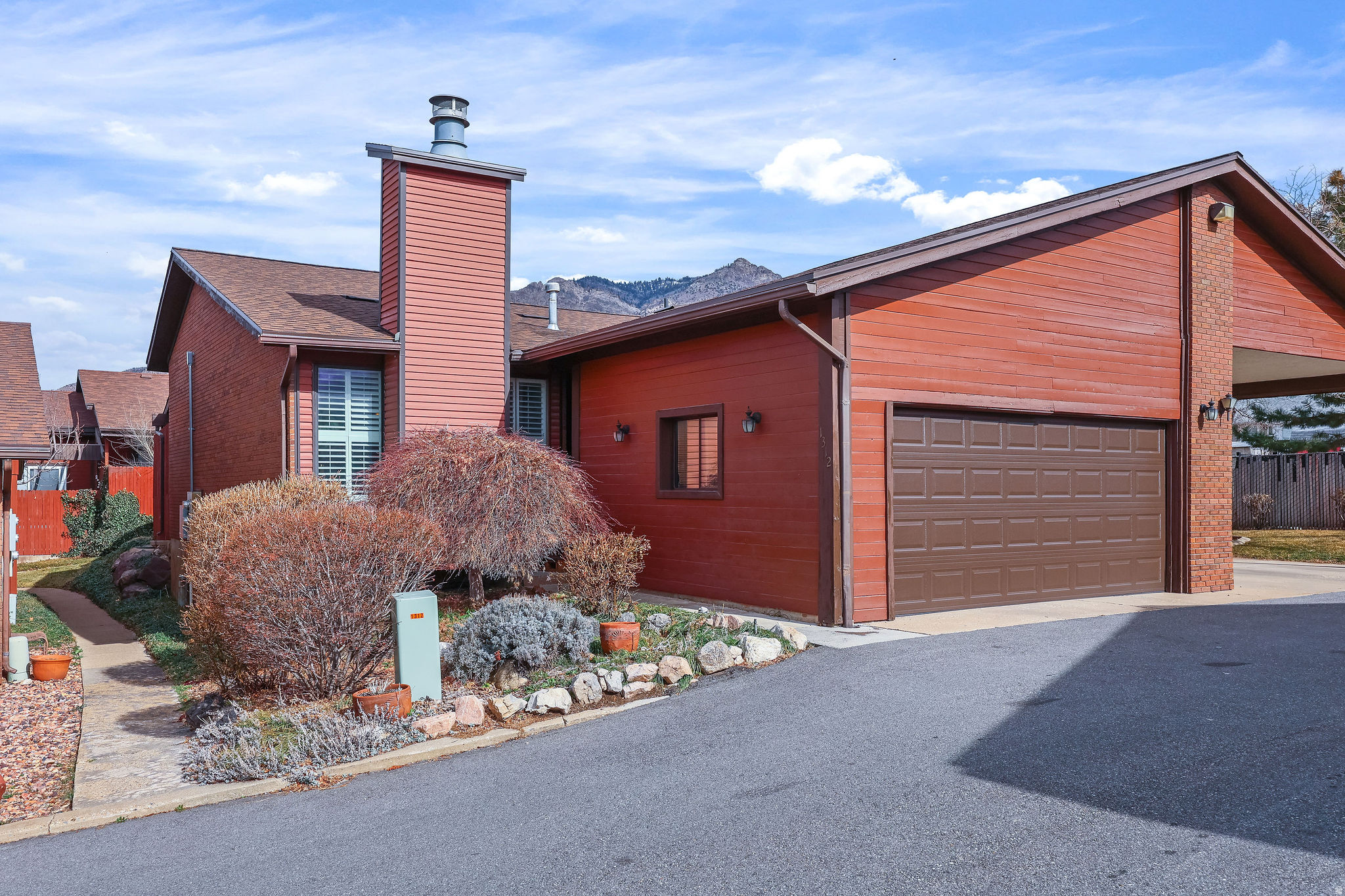 PRICE REDUCED.. $14,000   Seller Says Sell.  Make an offer.   This home has a 2 car garage   East Bench Home w/over 2200sqft.  Rambler style  one level living BIG ! Lots of light and bright.  Close to Ogden Canyon Hiking, Reservoirs & Skiing,  Spacious 3 Bedrooms, Great room floor plan with  Den, Office, Two Family rooms , Cozy fireplace.  2 Primary suites , access to private deck with 2020 hot tub.  A Separate office included.  Cozy Fireplace.  Near Hiking , Reservoir , camping and Skiing.  Great Place for the whole gang... Multi generational living or quiet place to slow down.