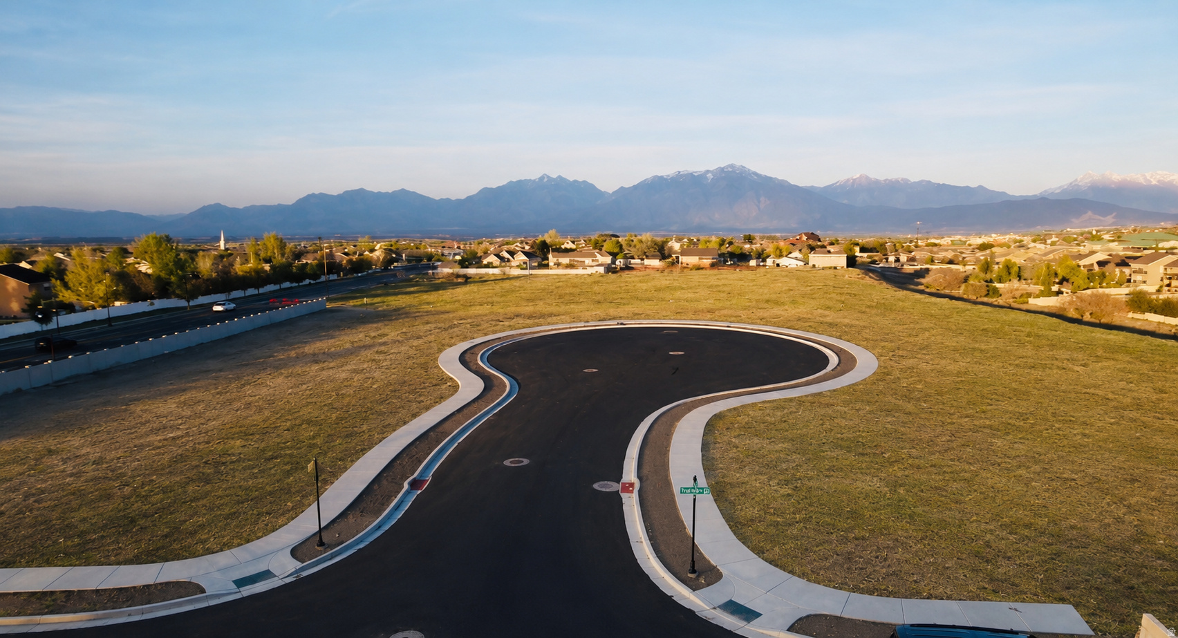 Amazing mountain views all around! This Large cul-de-sac lot in a prime location in Herriman has the perfect gradual slope for your dream walk out basement into a large flat backyard. This lot is perfect for building that big separate garage out back you've always wanted. No HOA! Bring your own builder or use ours.