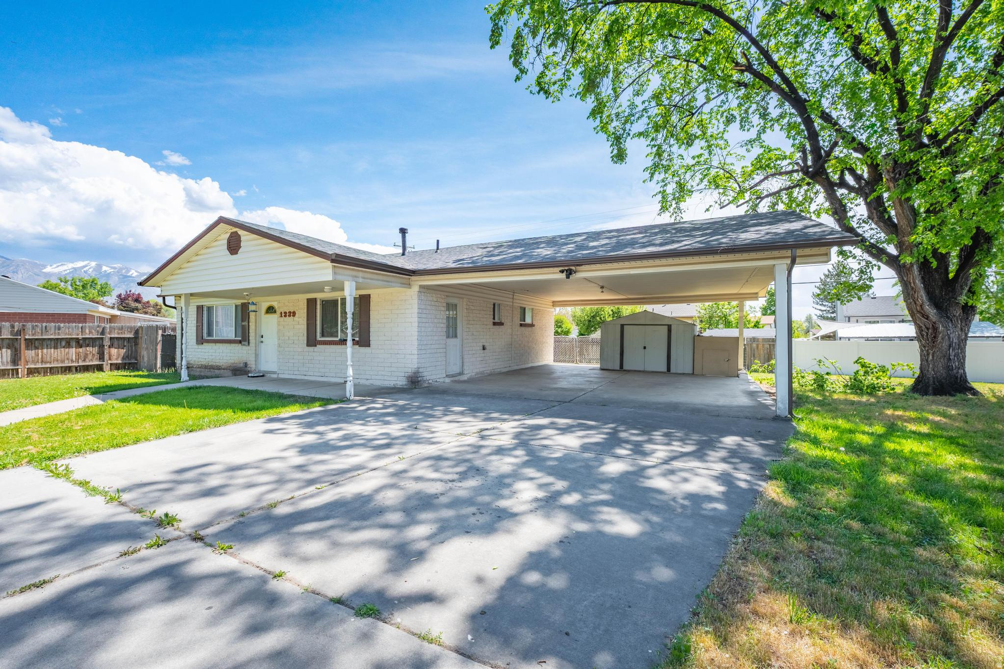 Welcome home to your beautifully updated rambler just 8 minutes from Hill Air Force Base. With a newer roof, paint, carpet, furnace, A/C unit, electrical panel, floors, windows and an updated kitchen and bathroom, you just need to move in! Situated in a cul-de-sac on a nearly 1/4 acre lot, you'll find the one story living to be simple and convenient and the yard space and privacy ideal. Being close to shopping and the freeway, will surely make everyday living and commuting more convenient too!