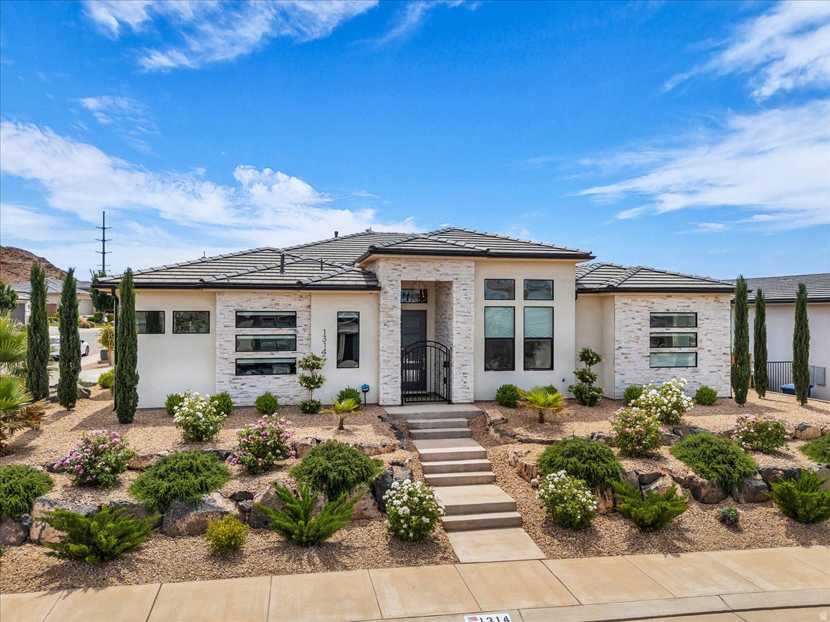 Clean, well-designed single-level home with great curb appeal and low-maintenance landscaping. Inside features an open floorplan filled with natural light, a spacious great room with tray ceilings and custom wall detail, and a beautiful kitchen with a large island, quartz countertops, stainless steel appliances, double ovens, and a gas cooktop. The primary suite offers a soaking tub, separate shower, dual vanities, and a large walk-in closet. Additional bedrooms are versatile for guests or office space, with new carpet being installed in all bedrooms. Enjoy the covered patio and private backyard--perfect for relaxing or entertaining. Conveniently located near local amenities in a desirable neighborhood. HOA amenities include community pool.