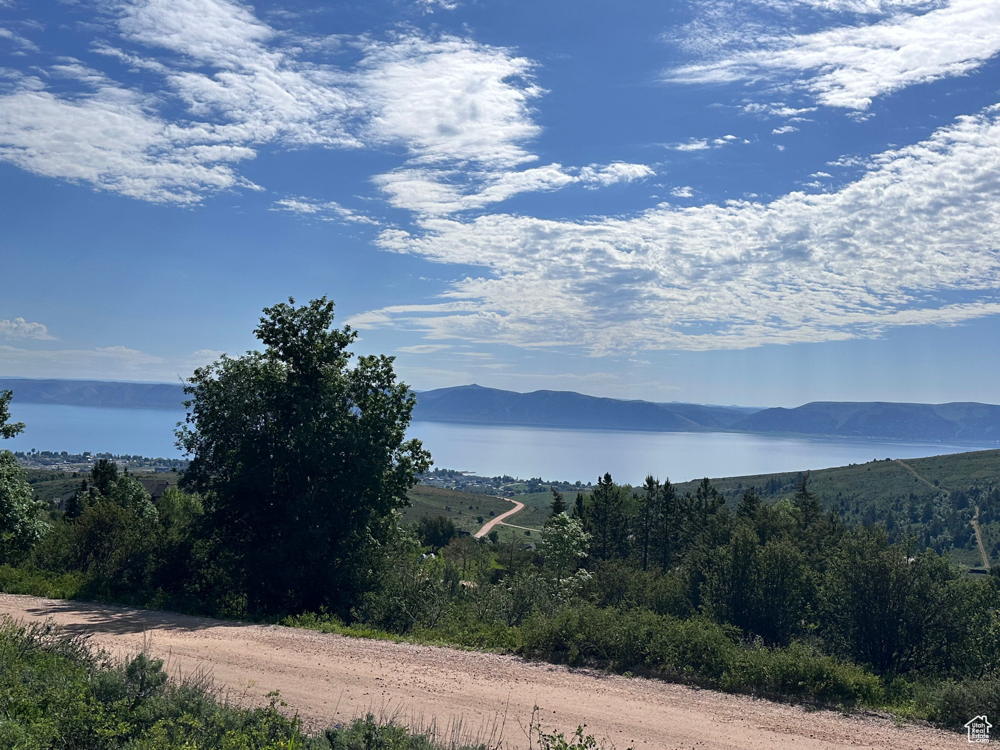 Beautiful .94 acre lot located in the desirable Bridgerland HOA with stunning views of Bear Lake and the surrounding mountains. Great opportunity to build your dream cabin or year round home with plenty of space to enjoy the outdoors. Ride your ATV or snowmobile directly from the property to miles of nearby trails and National Forest access. Easy year round access. Enjoy the peace, recreation and beauty Bear Lake is known for.