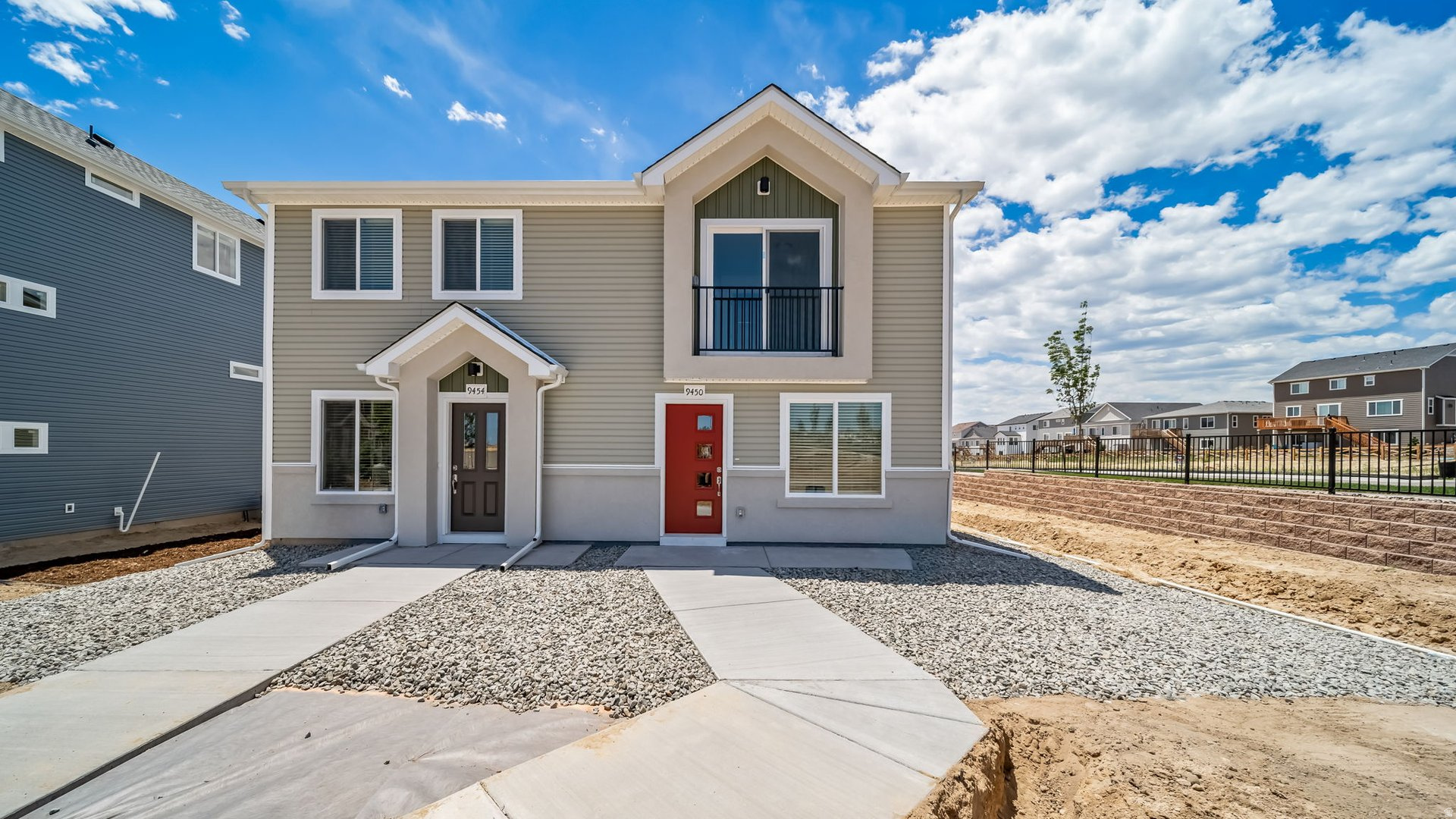 The Wayfarer is a two-story duet home offering 920 square feet of open-concept living space with 2 bedrooms, 2 bathrooms, and a 2-car alley-load garage. Inside, oversized windows fill the home with natural light, showcasing designer finishes, a large kitchen, and a primary suite with a walk-in closet. Wander is a family-friendly community on the north shore of Utah Lake, featuring proximity to parks, trails, shopping, and top-rated Alpine School District schools. Located 5 miles from I-15, the neighborhood offers easy access to recreation and entertainment in the Thanksgiving Point area. Visit the official community website for more details. Wayfarer Homesite 189