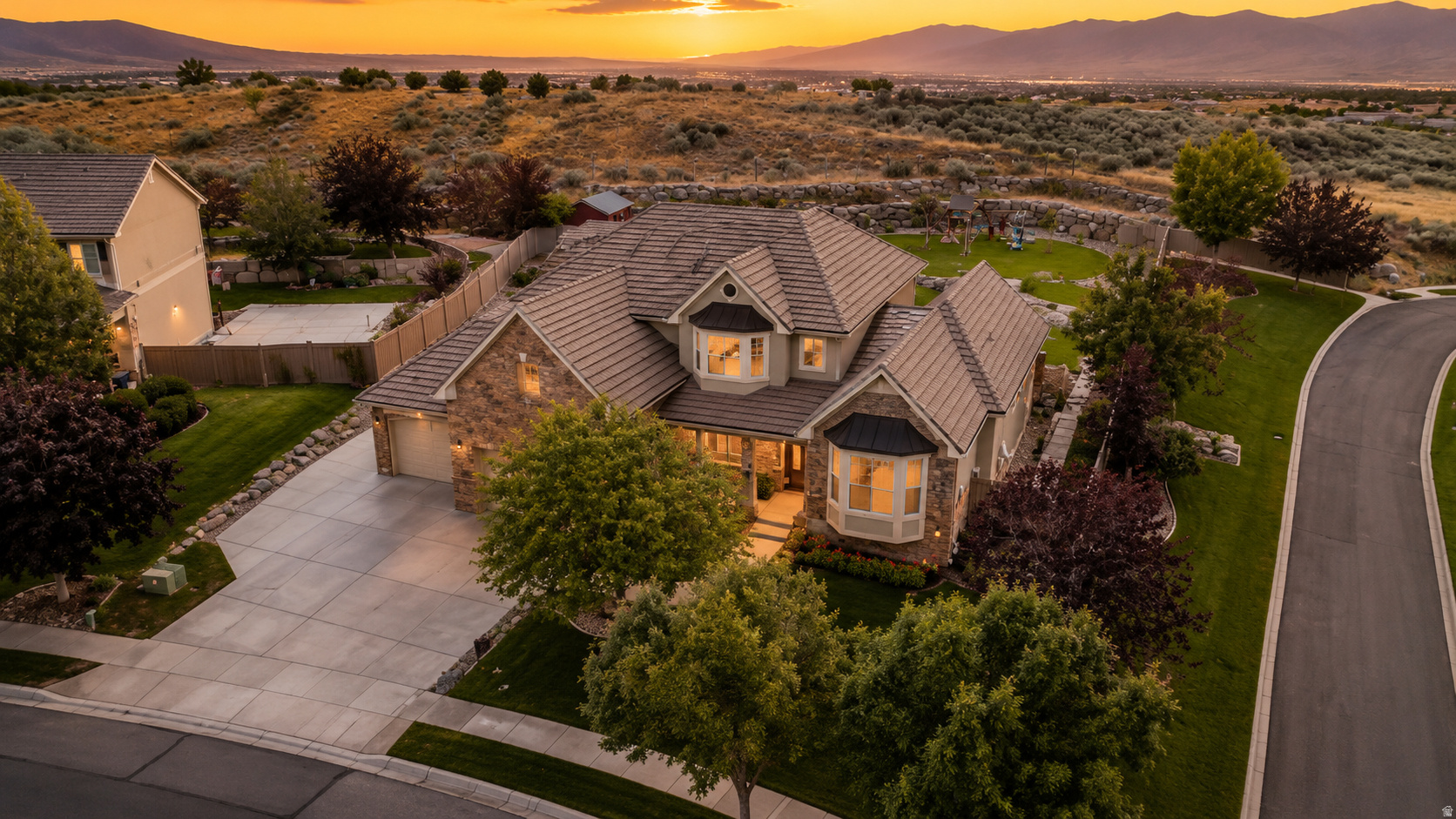 Beautiful Traverse Mountain Home with Walkout Basement & Scenic Privacy. Welcome to this desirable two-story home located in the highly sought-after Traverse Mountain community in Lehi. Offering 6 spacious bedrooms and 3.5 bathrooms, this home features a functional and inviting floor plan designed for both comfort and entertaining. Step inside to find tall ceilings and abundant natural light that create a bright and open atmosphere. The main-level primary suite provides convenience and privacy, complete with a walk-in closet and a luxurious ensuite bath featuring a separate tub and shower. Upstairs offers its own private wing, including two generously sized bedrooms, a loft area, and a full bathroom with large sink perfect for family or guests. The recently finished walkout basement adds incredible flexibility, with room to customize your dream space-whether it's a future kitchen, home gym, theater, or game room. Enjoy outdoor living in the beautiful backyard with a unique elevation, offering both privacy and space for entertaining, play, or relaxing.