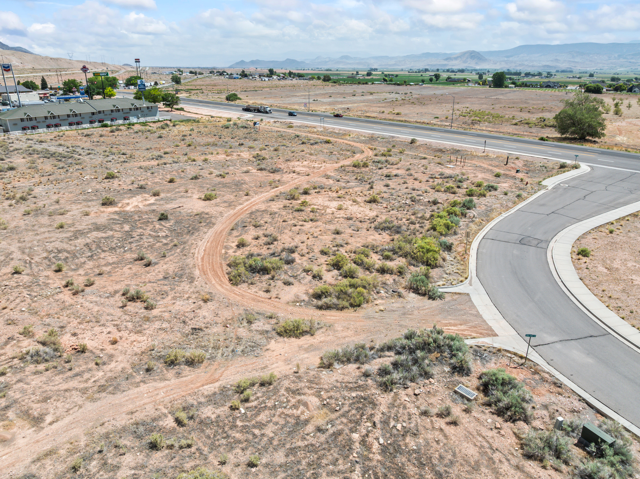 Prime Commercial Lot in Richfield, Utah Hard-to-find 1.15-acre commercial lot in one of Richfield's strongest growth corridors. This property offers excellent visibility, easy access, and a location that makes sense for a wide range of businesses. The lot is directly across from Sevier Valley Hospital, just minutes from the I-70 freeway entrance, and close to Main Street traffic. That combination gives it strong exposure from local residents, hospital traffic, and travelers coming through Central Utah. Richfield continues to be the commercial hub of Central Utah, and this location is positioned right in the path of growth. It could be a great fit for medical offices, retail, restaurant use, lodging, professional offices, or other service-based businesses. Commercial land in this area does not come available often. With hospital proximity, freeway access, and strong visibility, this is a solid opportunity for a business or investor looking for a prime Richfield location.
