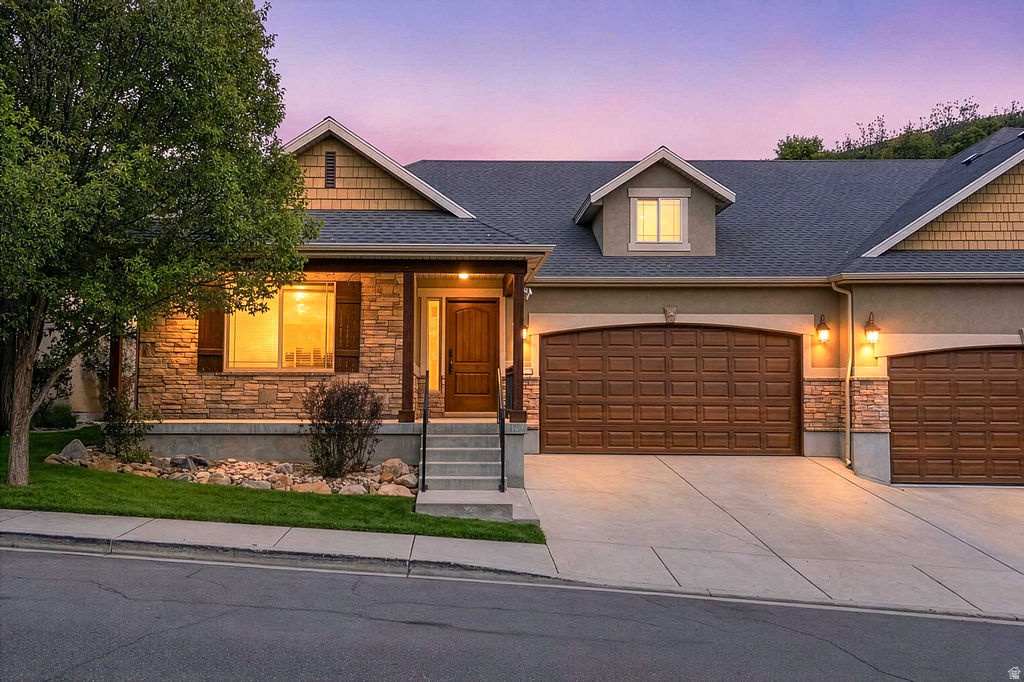 Tucked into a quiet gated community at the base of the foothills, this Draper townhome offers something rare: nature right in your backyard with the convenience of city living close by. Mature trees surround the home, and the back patio opens directly to walking, hiking, and biking trails. The views are the real draw here, and they don't disappoint. The main level features a primary bedroom with ensuite, plus a flexible extra room and full bath that works well as an office or den. Two additional bedrooms are located downstairs, where extra-tall ceilings make the lower level feel open and bright rather than like a typical basement. Both downstairs bedrooms are oversized. Inside, the home shows beautifully and is built to last. Granite counters run throughout, and the kitchen flows into a comfortable living area anchored by a gas fireplace. Large windows pull in the surrounding greenery and natural light. The gated community includes a clubhouse, and the setting is genuinely quiet and peaceful, with the feel of being away from it all. If you have been looking for a low-maintenance home with serious nature access and a true sense of retreat, this one is worth a look. Schedule your showing today.