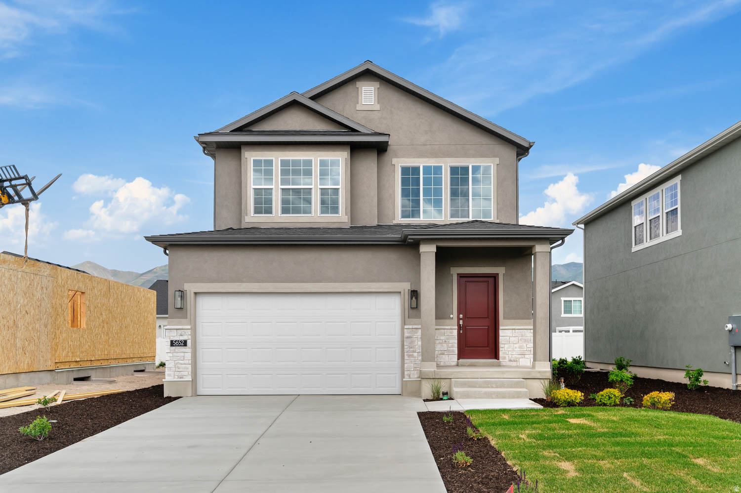 Beautiful Carson home plan in a great Stansbury Park master planned community! This stylish home features crisp white laminate cabinetry, quartz countertops, and stainless steel gas appliances. Thoughtfully designed with laminate hardwood, vinyl tile, and carpet flooring, along with recessed can lighting and craftsman-style baseboards and casing throughout. Additional highlights include convenient Christmas light outlets and an energy-efficient tankless water heater. The owner's bathroom showcases elegant quartz shower surrounds, while satin and brushed nickel hardware add a clean, modern touch. A perfect combination of style, comfort, and everyday functionality makes this home truly move-in ready.