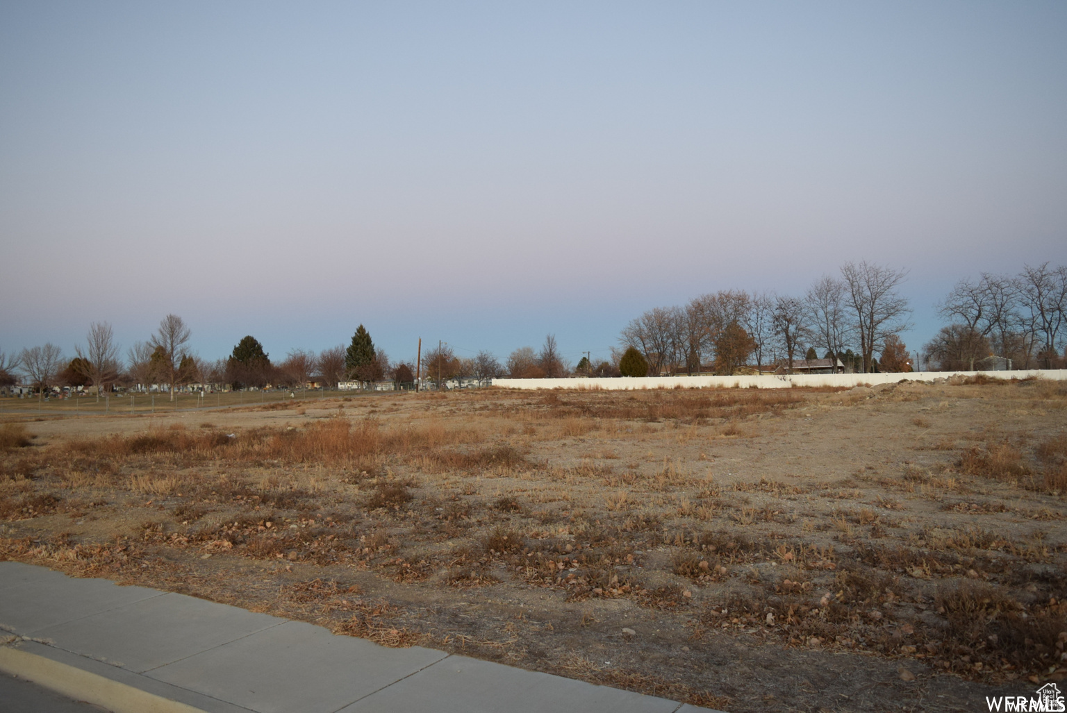 Great location close to schools and parks, the water park, and downtown. Culinary water, sewer, Power and irrigation water available in street. Buyer to verify all lot facts (acreage, boundaries, utilities, etc.) Acreage figures are provided as a courtesy estimate only. Buyer is advised to obtain an independent measurement.