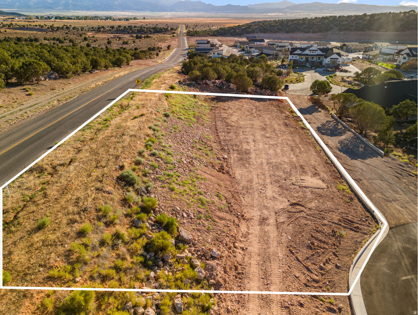 This is Lot Number 3, a 0.58-acre homesite located in the highly sought-after Estates at South Mountain subdivision. Enjoy stunning views of Shurtz Canyon and the surrounding Southern Utah mountains. This growing community is positioned near planned future elementary, middle, and high schools, adding long-term value and convenience. Bring your own builder or choose to build with the South Mountain Development Group. Don't miss this opportunity to secure a premium lot in one of Cedar City's most desirable neighborhoods. No HOA.