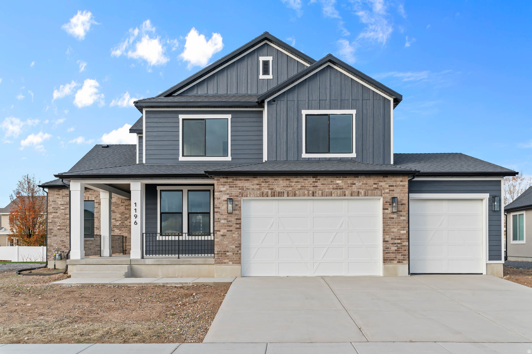 This beautiful brand new San Marino Craftsman is a stunning home blending timeless design with luxurious modern upgrades. The gourmet kitchen is a showpiece with cotton maple cabinets featuring LED lighting, quartz countertops, extended-height tile backsplash, and Caf stainless steel gas appliances with double ovens. The open-concept living area is anchored by a gas log fireplace with shiplap accents, perfect for cozy evenings. The owner's suite is a true retreat, complete with a box window, ceiling fan, Tori tub, tile shower surrounds, and an obscured glass window for natural light and privacy. A USB outlet adds convenience, while black matte hardware, textured walls, and two-tone paint bring a refined, contemporary look throughout. Designed for function and flexibility, This home includes an expanded 3-car garage with enlarged doors and exit door, 9 Foot Basement Foundation Walls, French doors to the office, and a spacious covered deck for outdoor living. Additional highlights include a water softener, gas line to dryer, flood light package, Christmas light outlets, and large Craftsman base and casing. With thoughtful details in every corner, this home combines elegance, comfort, and practicality all in a great community!
