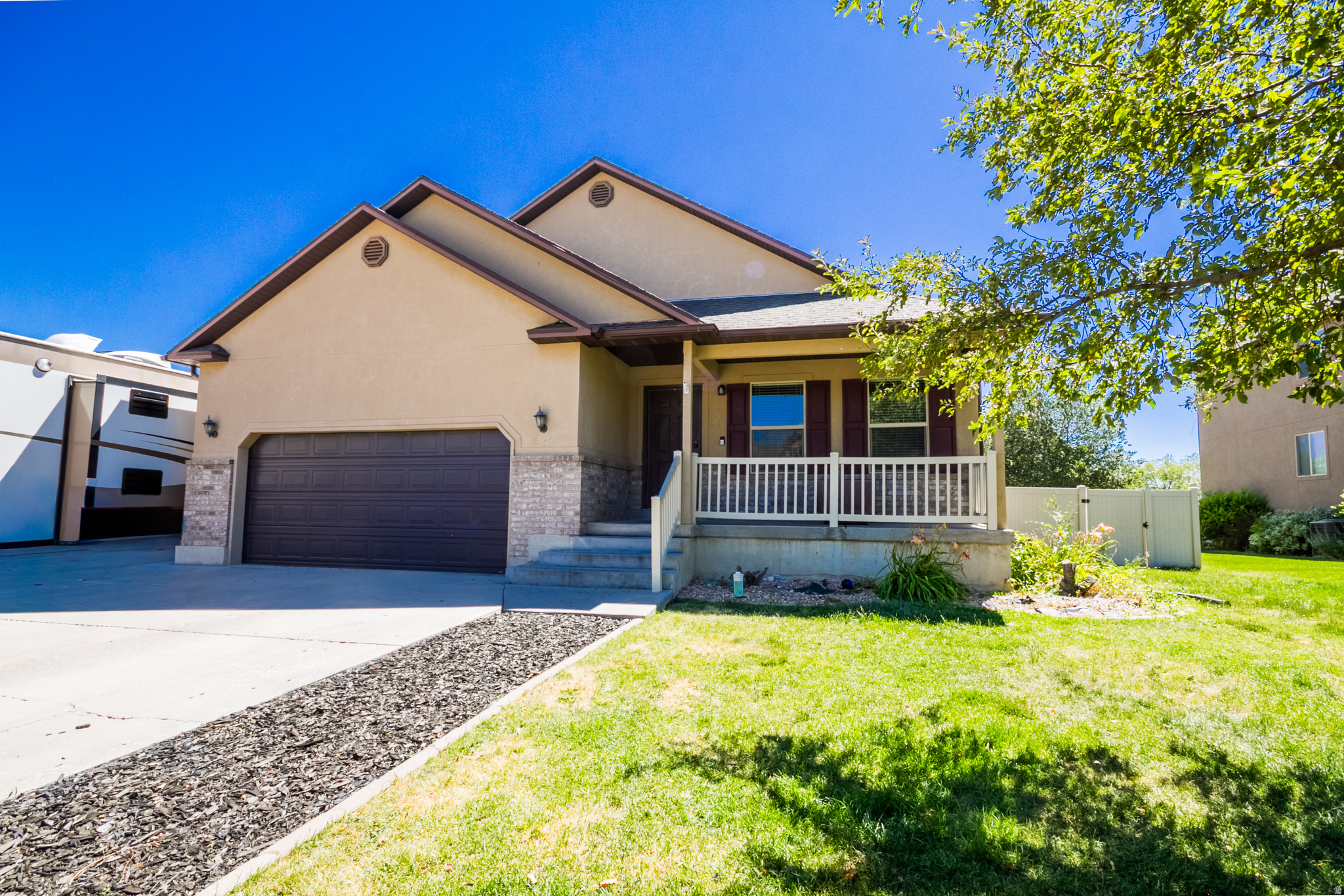 Tucked at the end of a quiet dead-end street with minimal traffic, this spacious 6-bedroom, 3-bathroom home offers the perfect blend of open-concept living and versatile space for the whole family. The main level features a bright, open-concept layout where the dining, family, and kitchen areas flow seamlessly together - ideal for entertaining or everyday living. Downstairs, the fully finished basement adds even more functionality with a second kitchen and wet bar, perfect for multigenerational living, guests, or hosting game day. Storage won't be a problem here - a large cold storage room provides excellent space for extra food storage, seasonal items, or homesteading needs. Outside, the fully vinyl-fenced backyard is thoughtfully divided into two functional spaces: a gravel parking area - perfect for storing your boat, RV, trailer, or other toys - and a separate landscaped area ready for your personal touch. The sprinkler system is fully operational, offering an easy option to plant new grass seed or install low-maintenance turf to create your ideal outdoor retreat. Don't miss this rare opportunity for space, privacy, and flexibility at the end of a peaceful dead-end street!  Square footage figures are provided as a courtesy estimate only and were obtained from county records .  Buyer and buyer agent is advised to obtain an independent measurement.