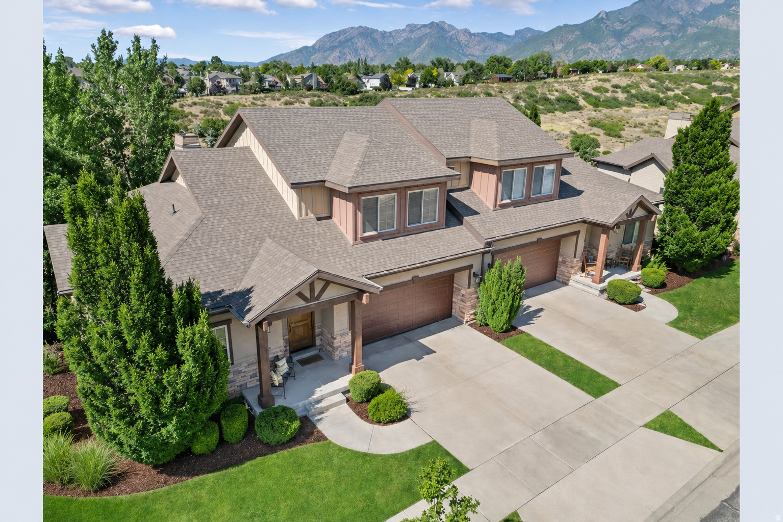 Experience elevated living in this stunning 2026 remodeled mountain modern home backing directly to Dimple Dell Regional Park with sweeping mountain and valley views from every level. Thoughtfully redesigned with high-end finishes and functional luxury throughout, this home offers the perfect blend of modern sophistication and outdoor lifestyle.  The main level features a spacious primary suite with a spa-inspired bathroom complete with heated floors and a curbless, zero-entry shower. A second bedroom and full bathroom with walk-in shower on the main floor could also be used as a home office or guest bedroom.  The gourmet kitchen is designed to impress with waterfall-edge countertops, premium Bosch appliances, double ovens, and sleek contemporary finishes that flow seamlessly into the open-concept living and dining spaces. The main-level laundry completes the first floor. Upstairs, you'll find two oversized bedrooms and a full bathroom, offering privacy and mountain views. The walkout basement is perfectly suited for guests, entertaining, or potential mother-in-law accommodations with its own kitchenette, laundry, full bathroom, and additional bedroom.  Step outside to multiple balconies overlooking the natural beauty of Dimple Dell, where mountain views create a true retreat atmosphere. Enjoy immediate access to miles of trails, while still being conveniently located near shopping, dining, grocery stores, and only 15 minutes from world-class skiing in Little Cottonwood Canyon and Big Cottonwood Canyon.  This is mountain modern living at its best-luxurious, functional, and surrounded by some of Utah's most beautiful scenery.