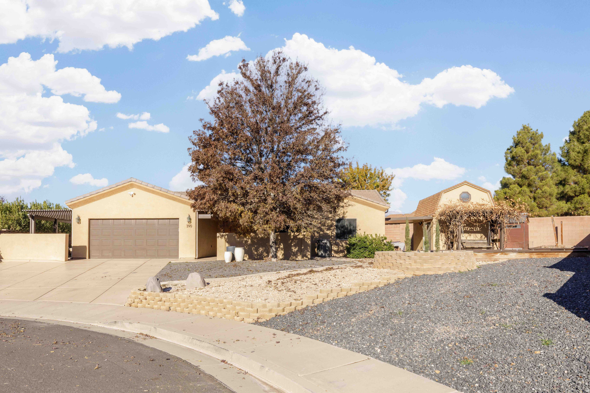 Looking for a 2nd home in So. Utah that can pay for itself when you're not staying there? Look no further! Looking for a welcoming, quiet Southern Utah neighborhood that's close to some of the most beautiful scenery in the entire world including many national and state parks? Look no further! This updated single-level home with an existing STR license from LaVerkin City is the perfect place for you!! Just 20 minutes to Zion National Park!  While several Washington county cities have suspended new STR Licenses, you can maintain the existing license on this property by simply renting it out at least once per year. Sellers will transfer current Airbnb & VRBO accounts to new owner, so no setup needed, plus you get the immediate benefit of a 4.9/5.0 rating with over 230 reviews. And when you're not staying with family and friends, open it up for STR bookings and let guests pay your mortgage for you. Located on a quiet street with mountain views. Multiple outdoor, covered sitting/eating areas make this home perfect for entertaining, or lounging at any time of day. Great room features a gas fireplace and large flat screen TV with comfortable couches. Large kitchen is fully stocked and features newer stainless high-end appliances, and brand new quartz counter tops. Bar seating and a large dining table allow mealtime to become a true gathering. Recently updated bathrooms. The separate casita adds another 288 sq. Ft. of living space,(not included in sq. footage figures) with stand-alone heating/AC units and a finished loft. Allowing a great space for kids and grandkids to gather & play, plus extra sleeping space. Pristine yard fenced on 3 sides by an 8 ft. privacy wall. Shaded pergola grapevine covered yard swing to relax in. Graveled RV parking for travel trailers or toys. Close to all of the great things in Southern Utah! This home comes fully furnished and is 100% turnkey ready. Come and see for yourself. Schedule a showing today! Square footage figures are provided as a courtesy estimate only. Buyer is advised to obtain an independent measurement.